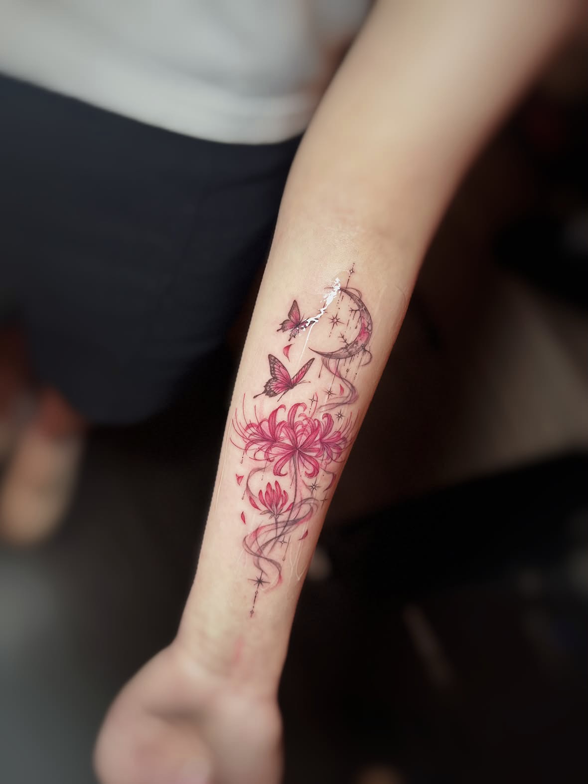 Chrysanthemum and butterflies watercolor tattoo on the forearm by 墨匠紋身|新店店, New Taipei City