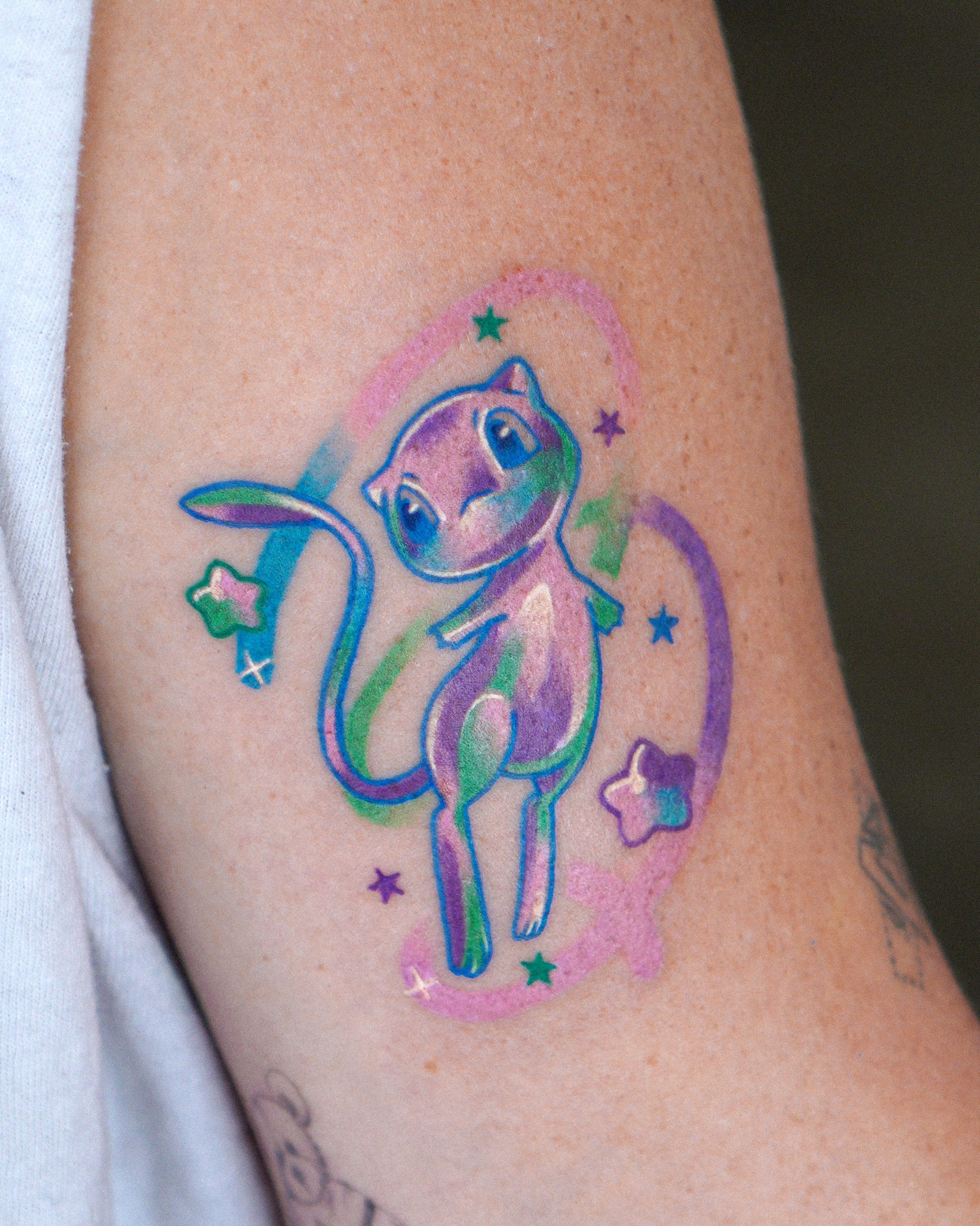 Cat watercolor tattoo on the forearm by Eden