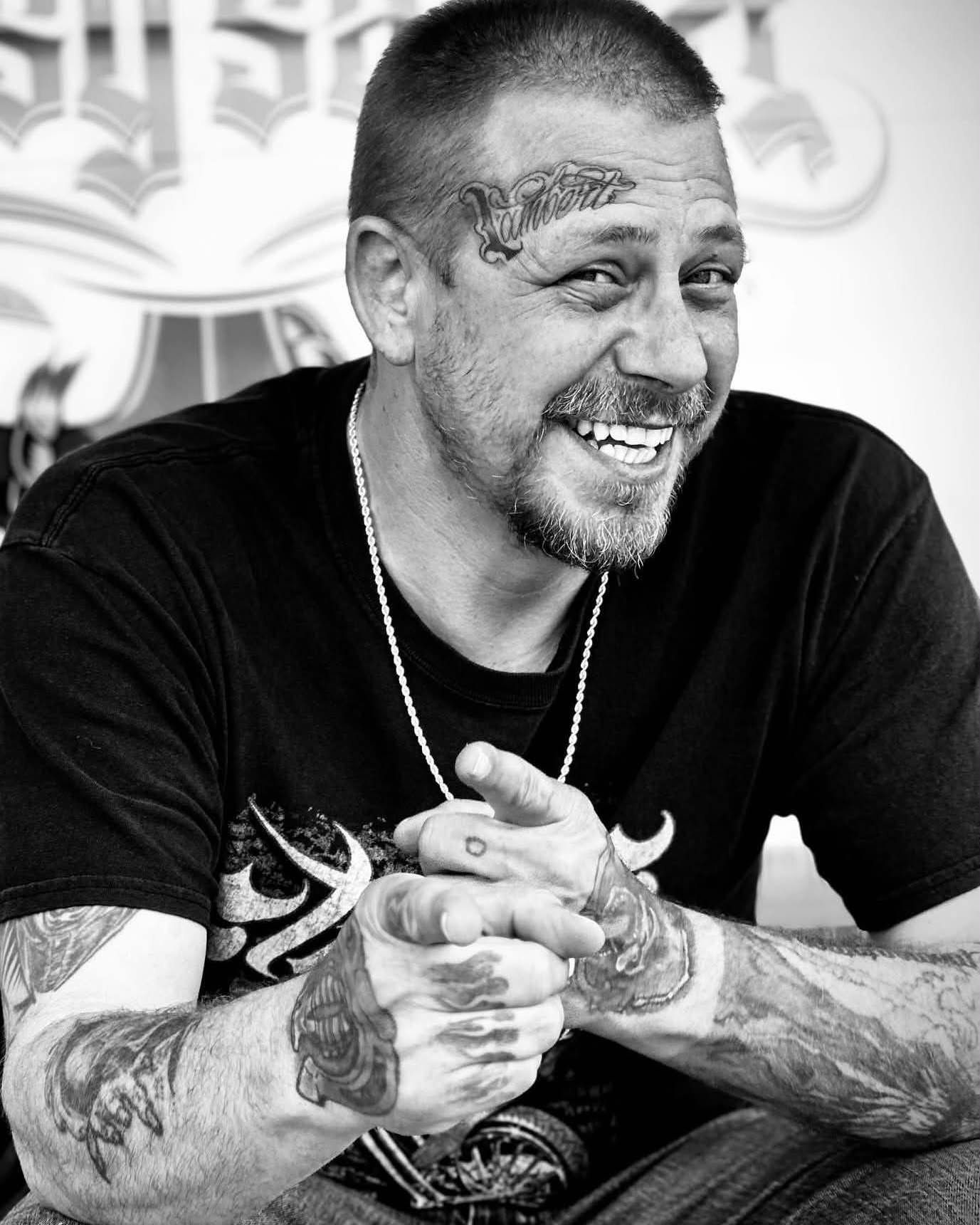 Tattooed hands black and grey tattoo by Brian Lambert