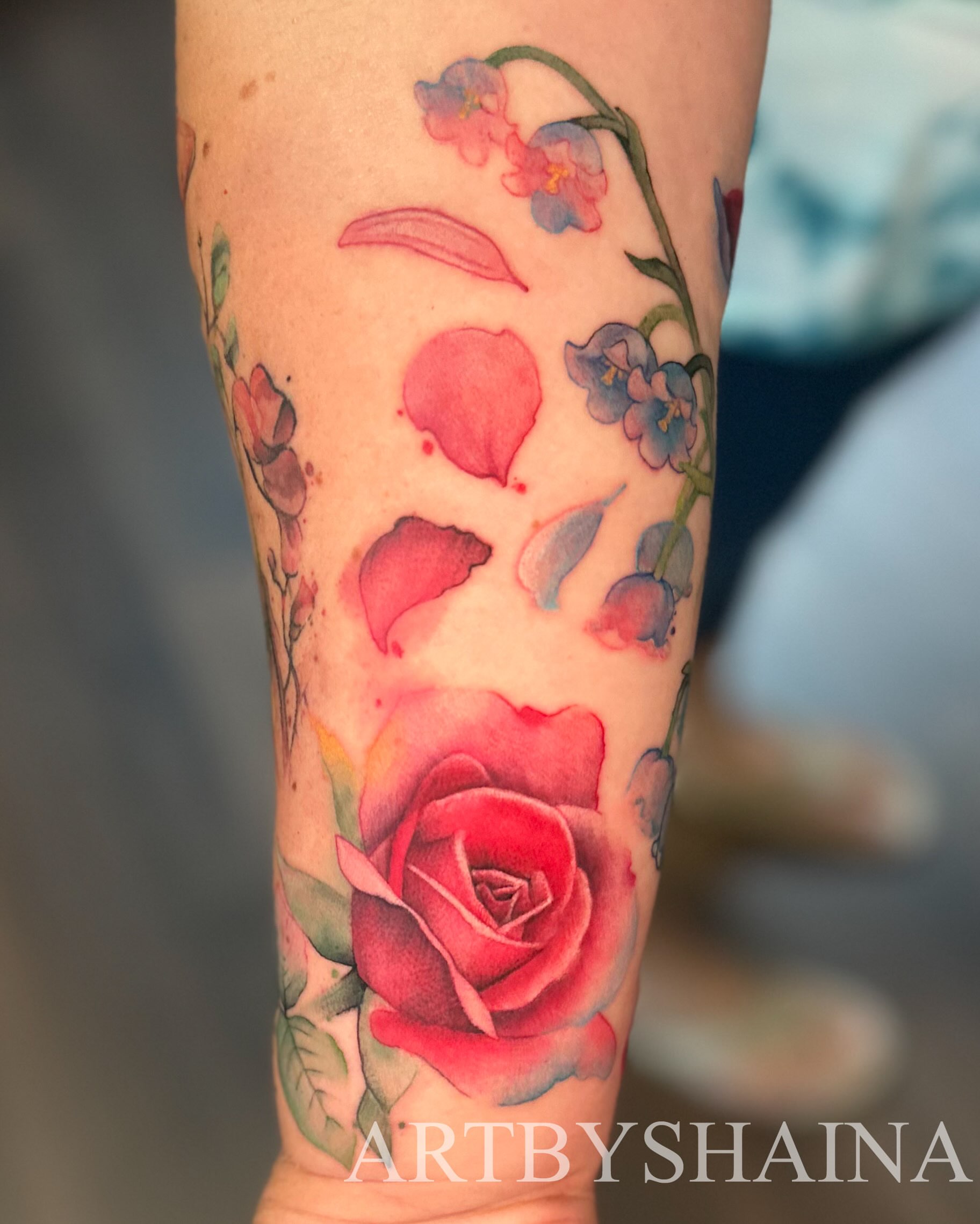 Watercolor floral arrangement watercolor tattoo on the forearm by ππ·π°πΈπ½π°