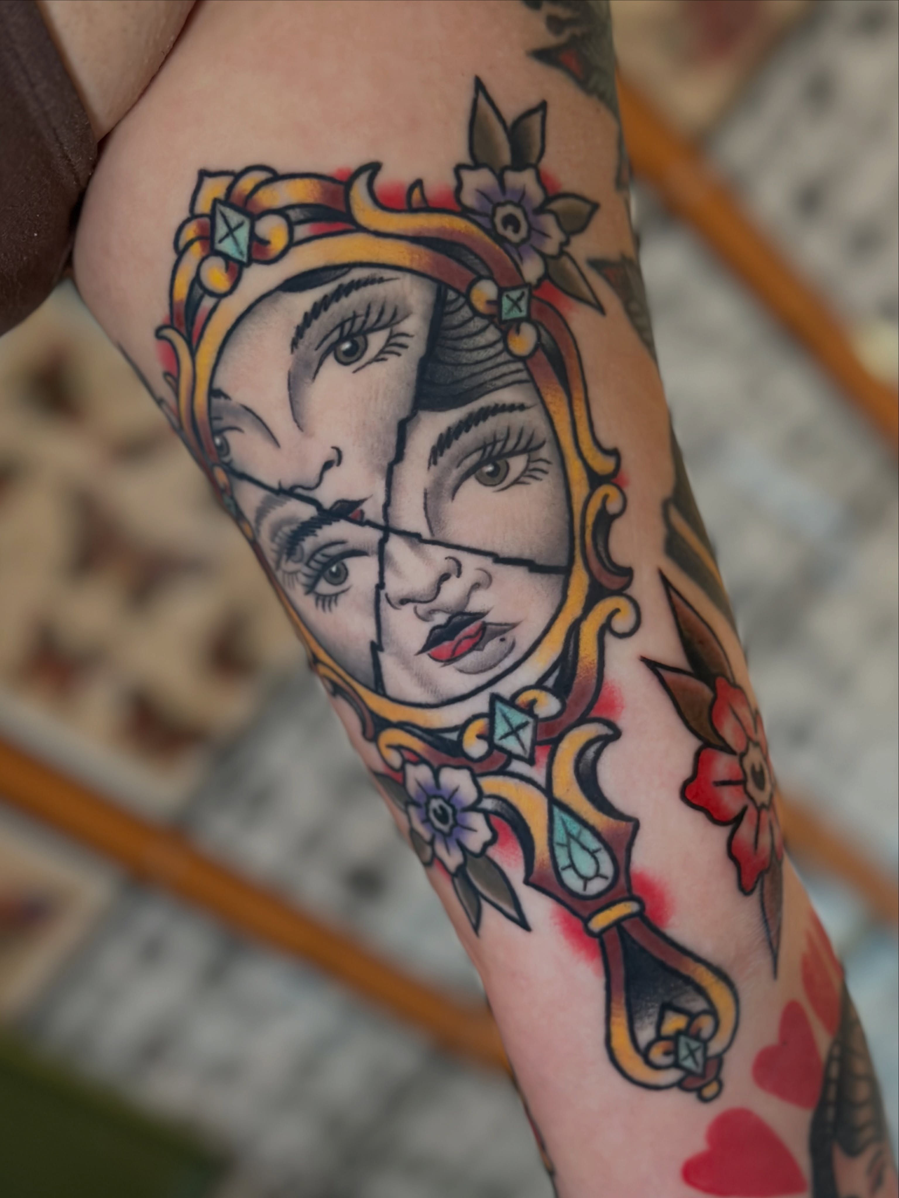 Mirror reflection American traditional tattoo on the forearm by Michael Williams