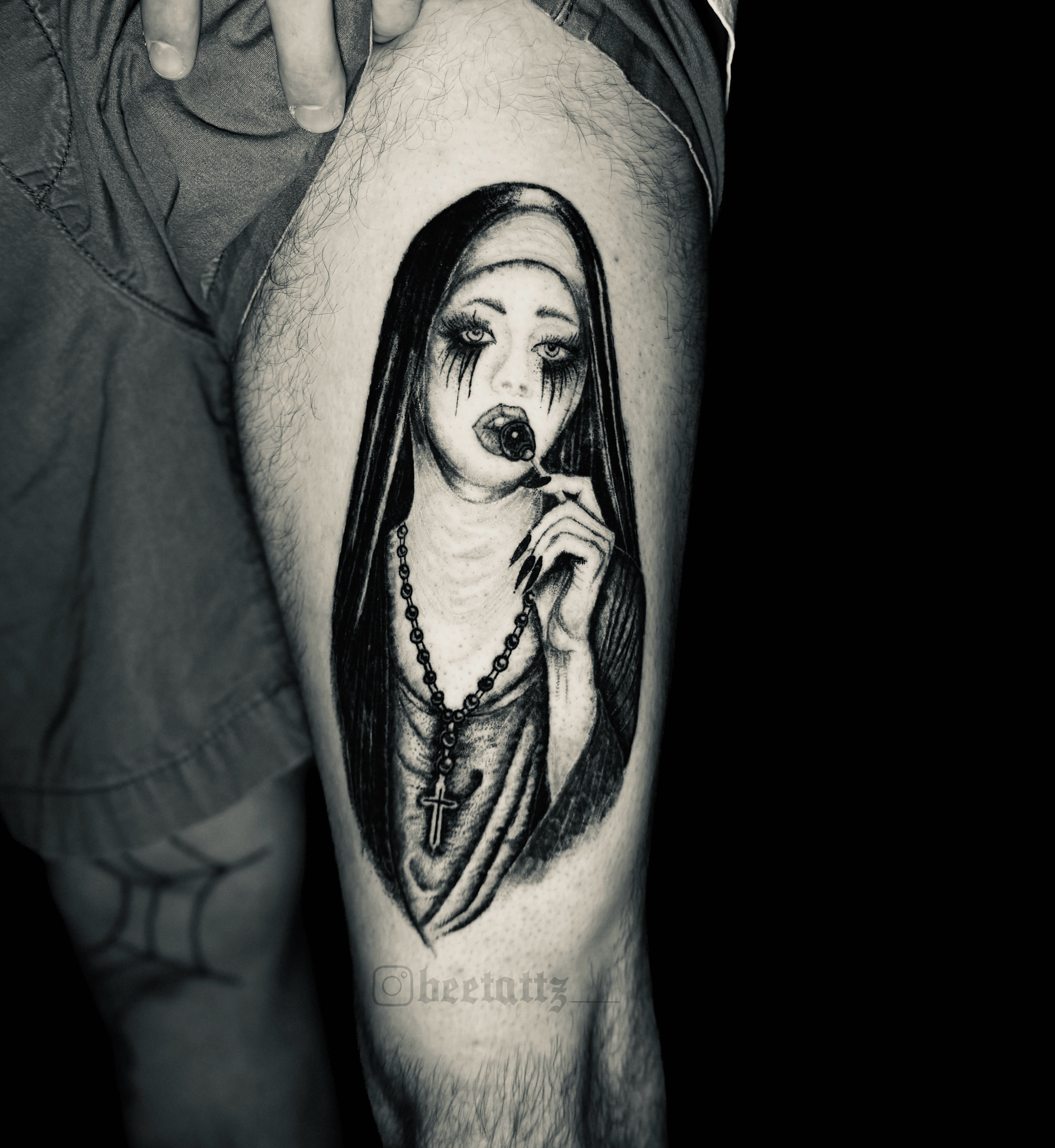 Nun realism tattoo on the thigh by Brinkley McGill