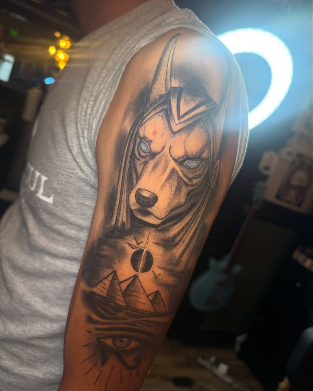 Ancient deity realism tattoo on the forearm by Mtctattoos