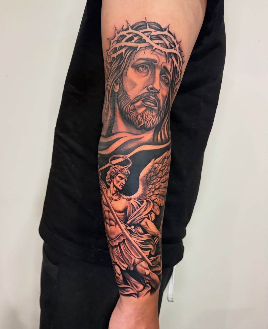 Religious figures realism tattoo on the forearm by Osiel Rodriguez