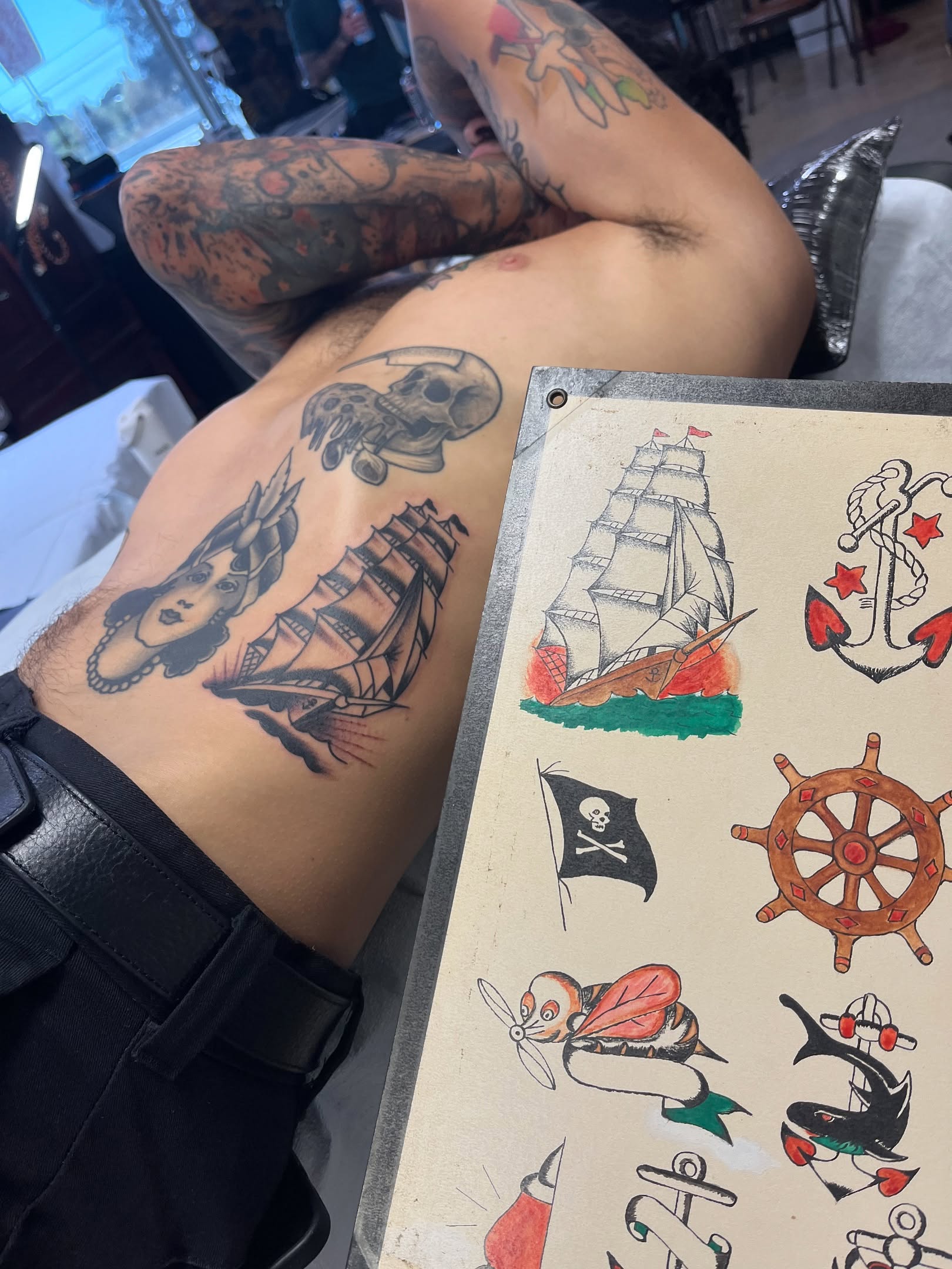 Pirate ship and woman American traditional tattoo on the thigh by Tim Howell