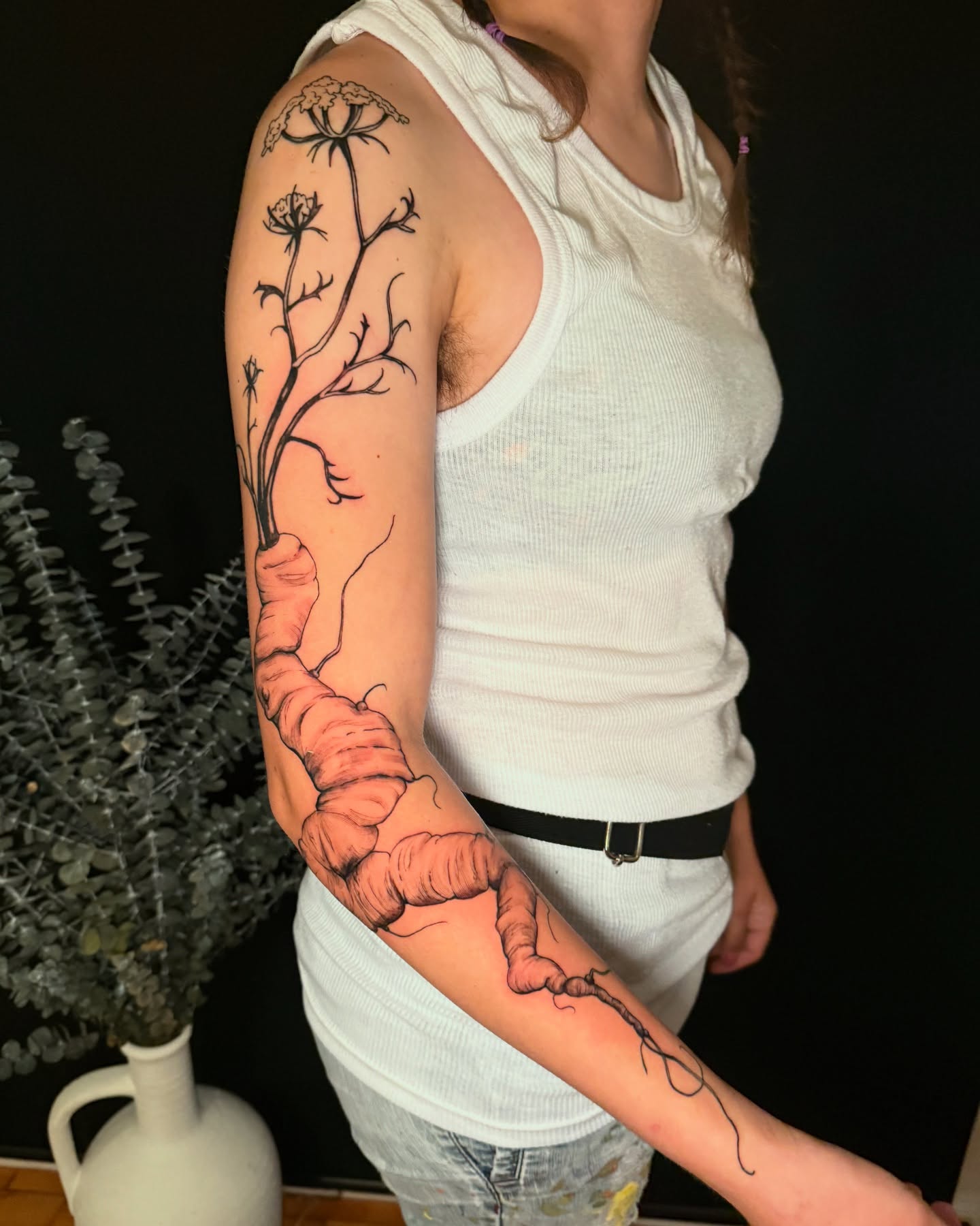 Carrot plant realism tattoo on the forearm by marlena borscheid