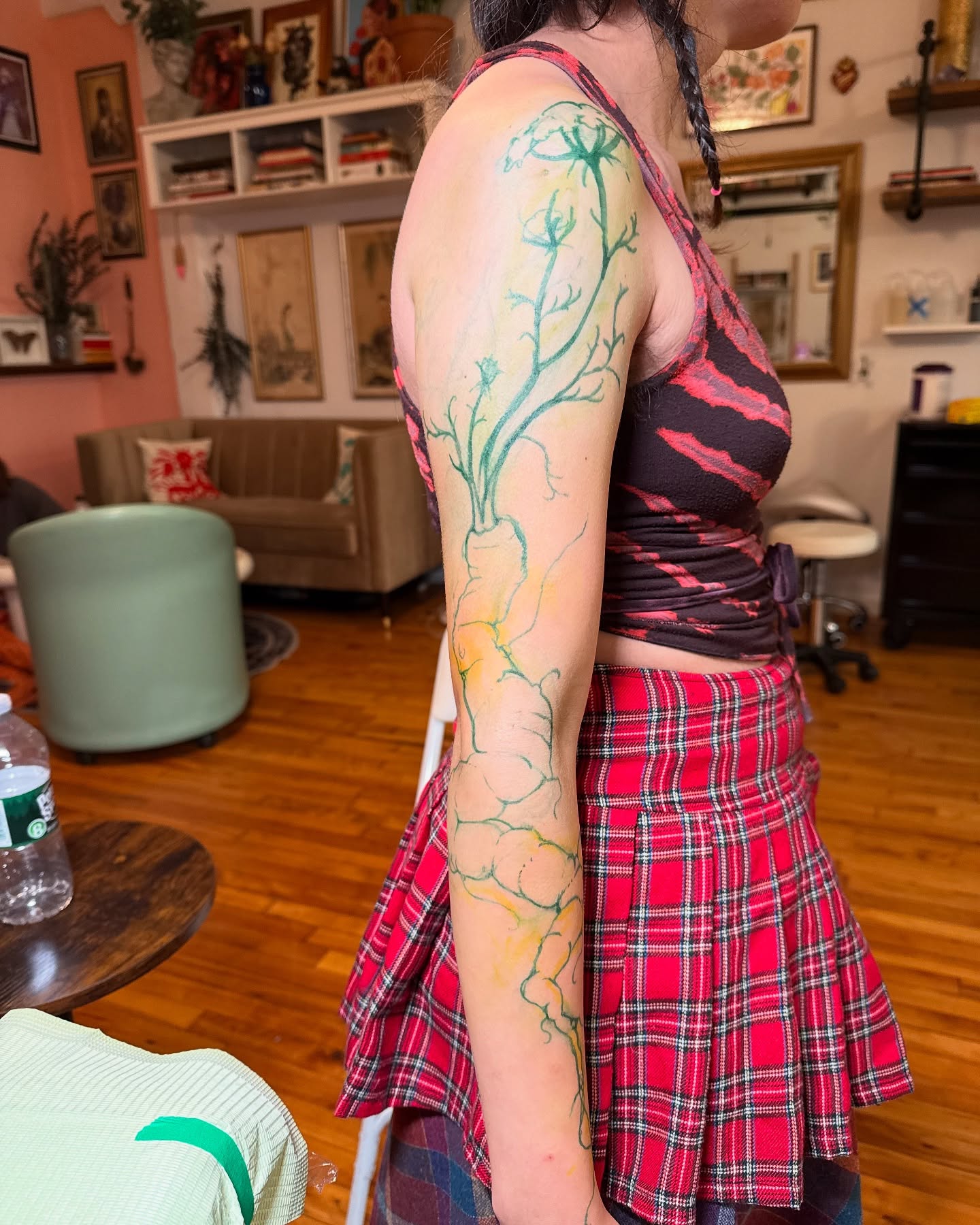 Root watercolor tattoo on the upper arm by marlena borscheid