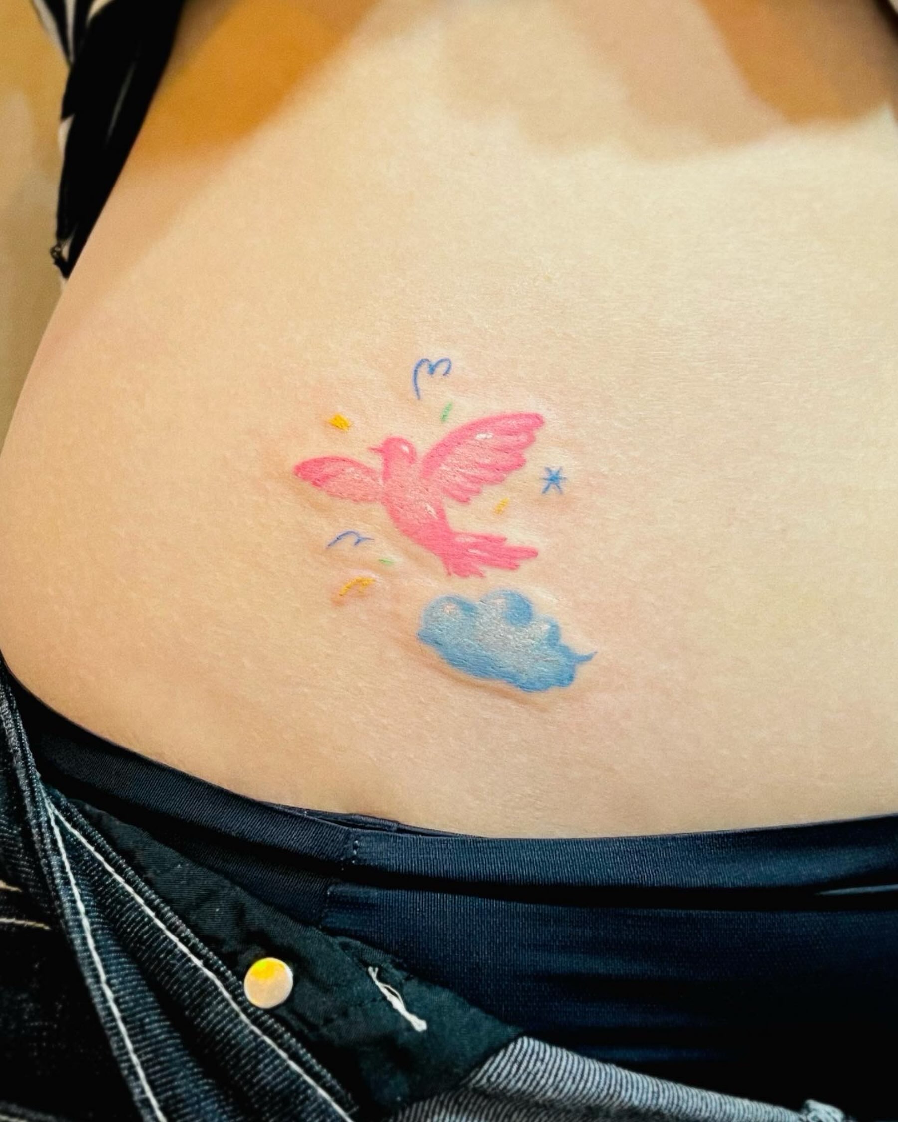Bird watercolor tattoo by Purinn
