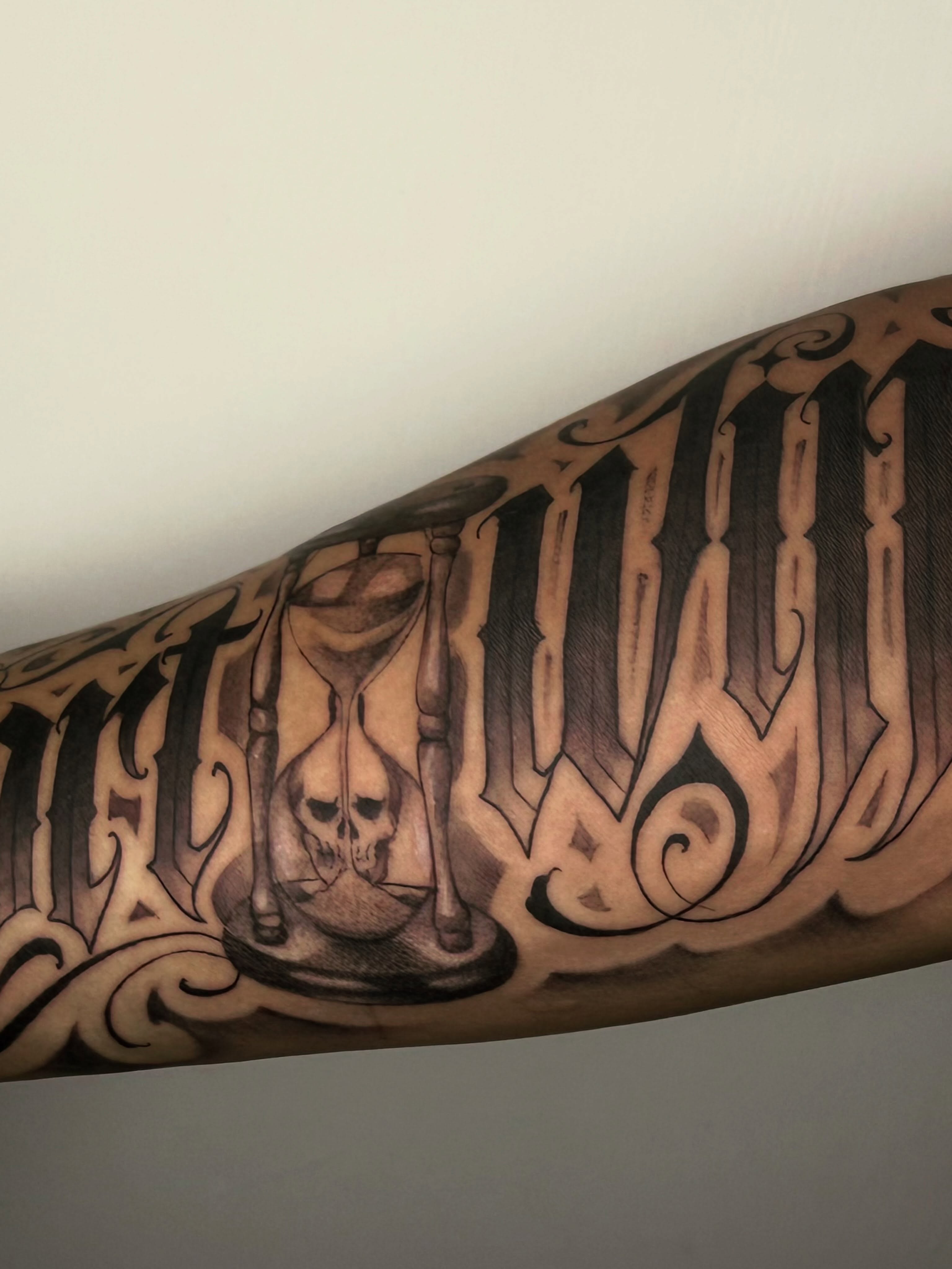 Tattoo by @echoink_tattoo — black_and_grey, lettering_script
