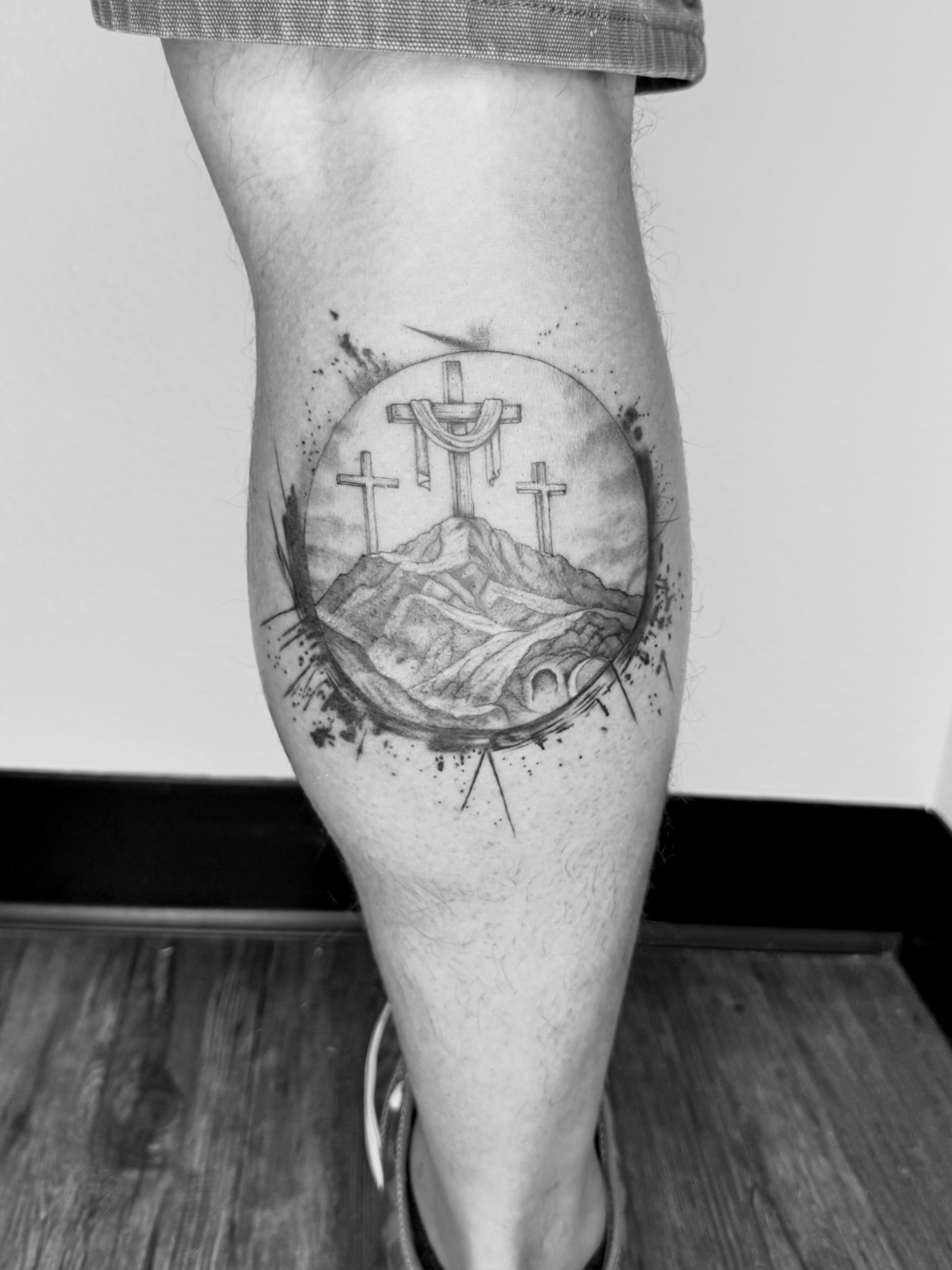 Three crosses black and grey tattoo on the calf by Ashley Limon
