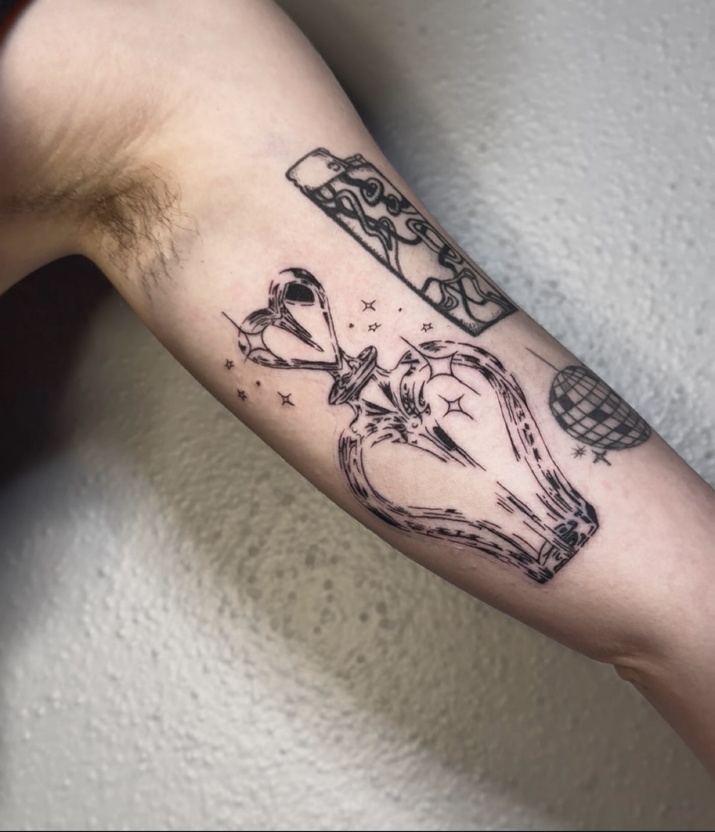 Astronaut and globe black and grey tattoo on the forearm by Cullen-Lee