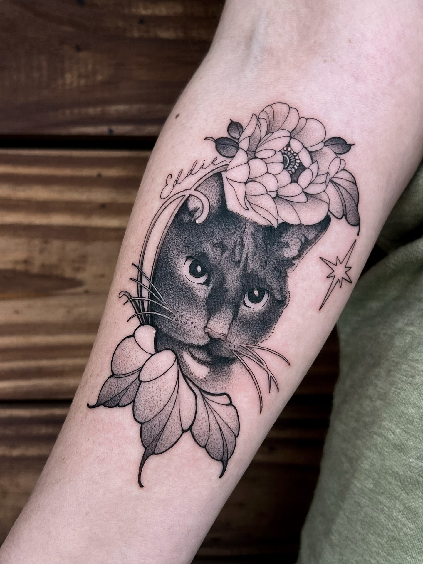 Cat dotwork tattoo on the forearm by Tehnaya
