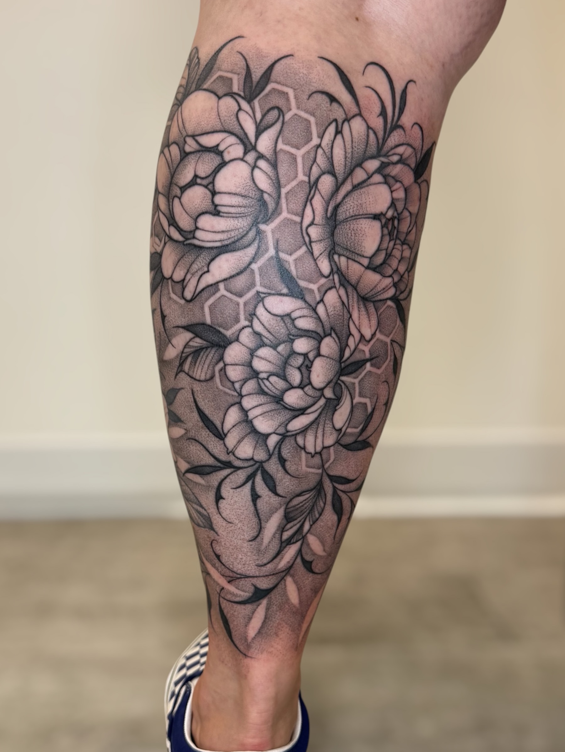 Peony flowers dotwork tattoo on the calf by Tara Crespi - Female Tattoo Artist 💜