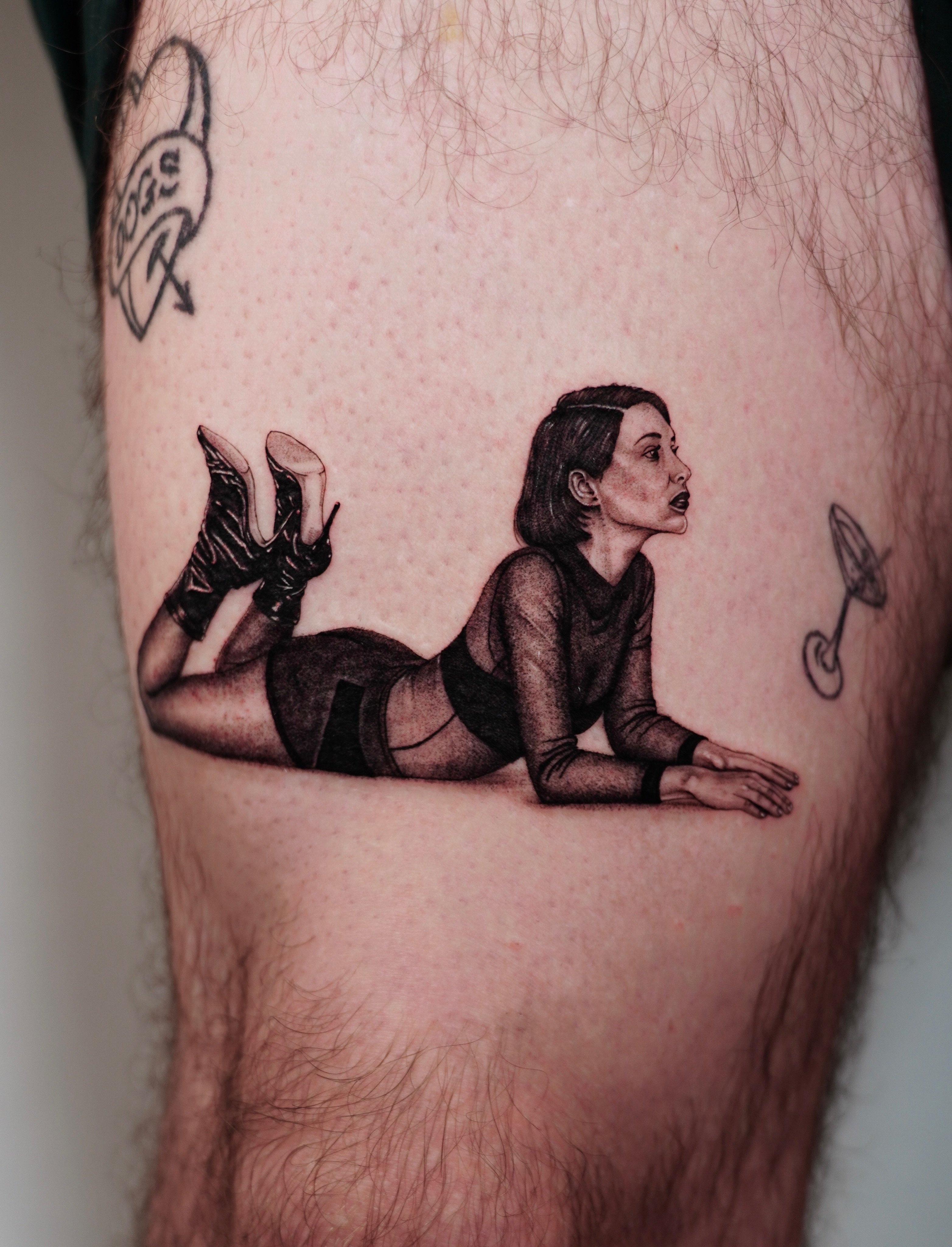 Woman in lingerie realism tattoo on the thigh by Sophia Delfino