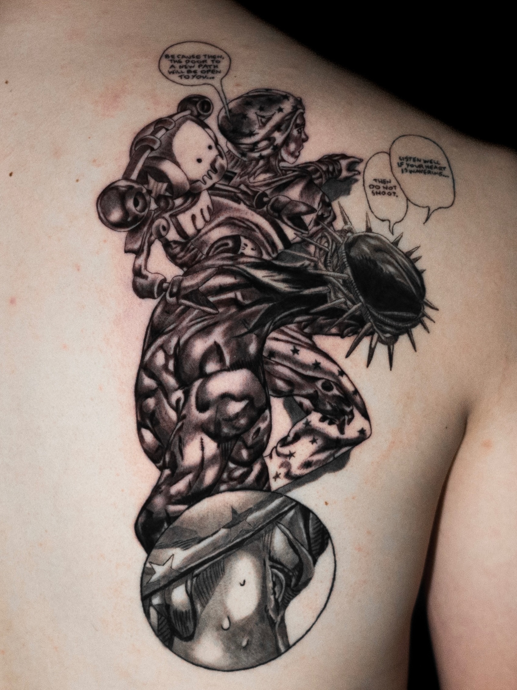 Military soldier black and grey tattoo on the back by Tattoo Artist