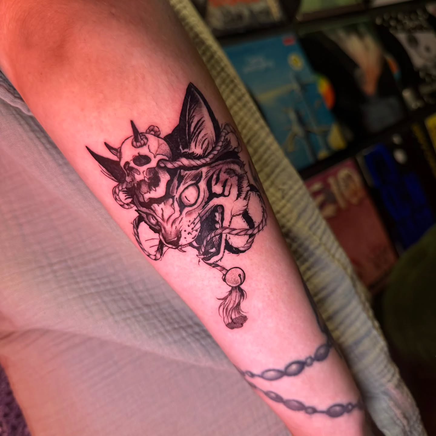 Skull and cat black and grey tattoo on the forearm by 🌙 Alessio