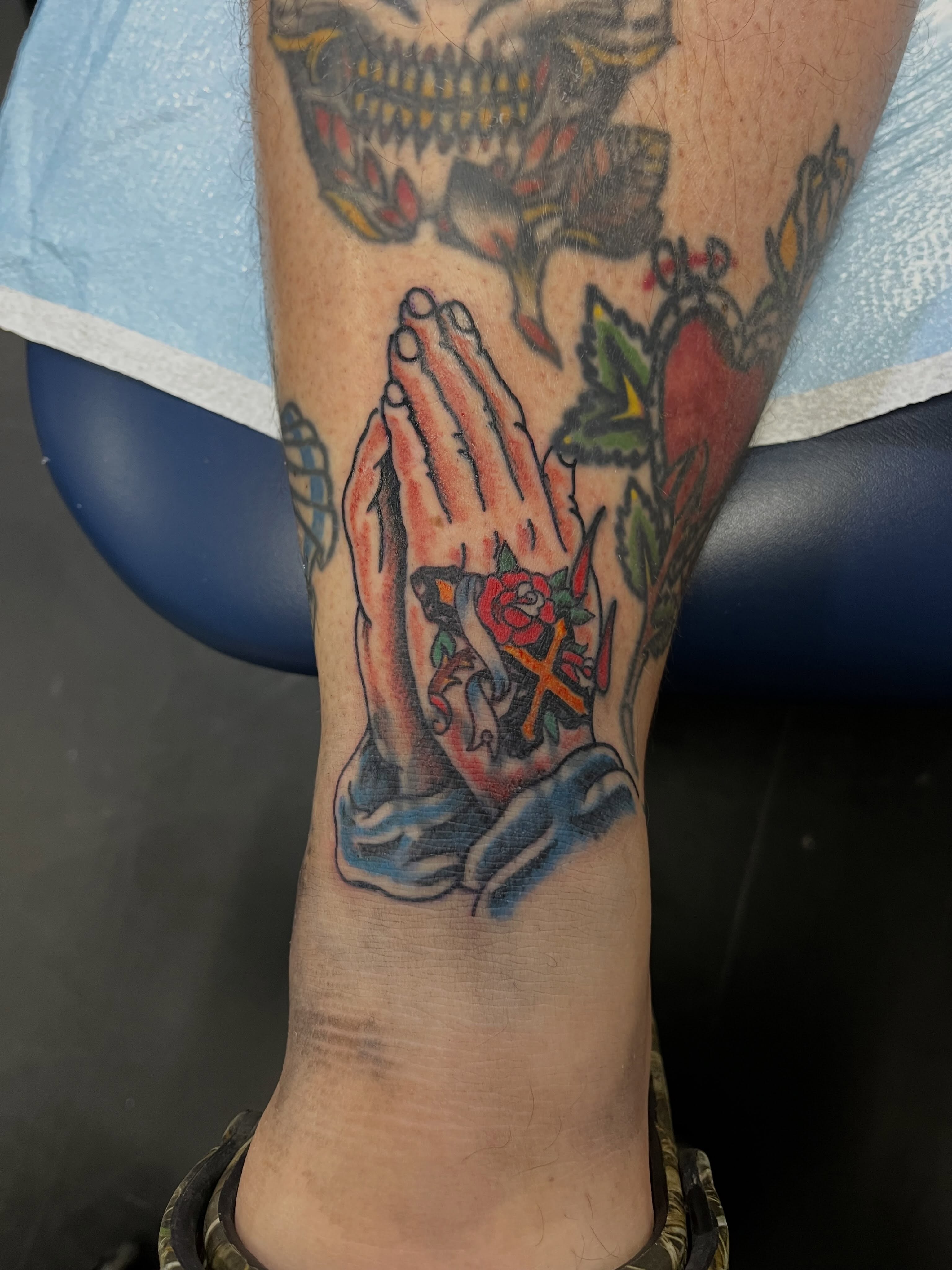 Praying hands American traditional tattoo on the calf by CRAIG B⛓️ Cincinnati Tattoo Artist