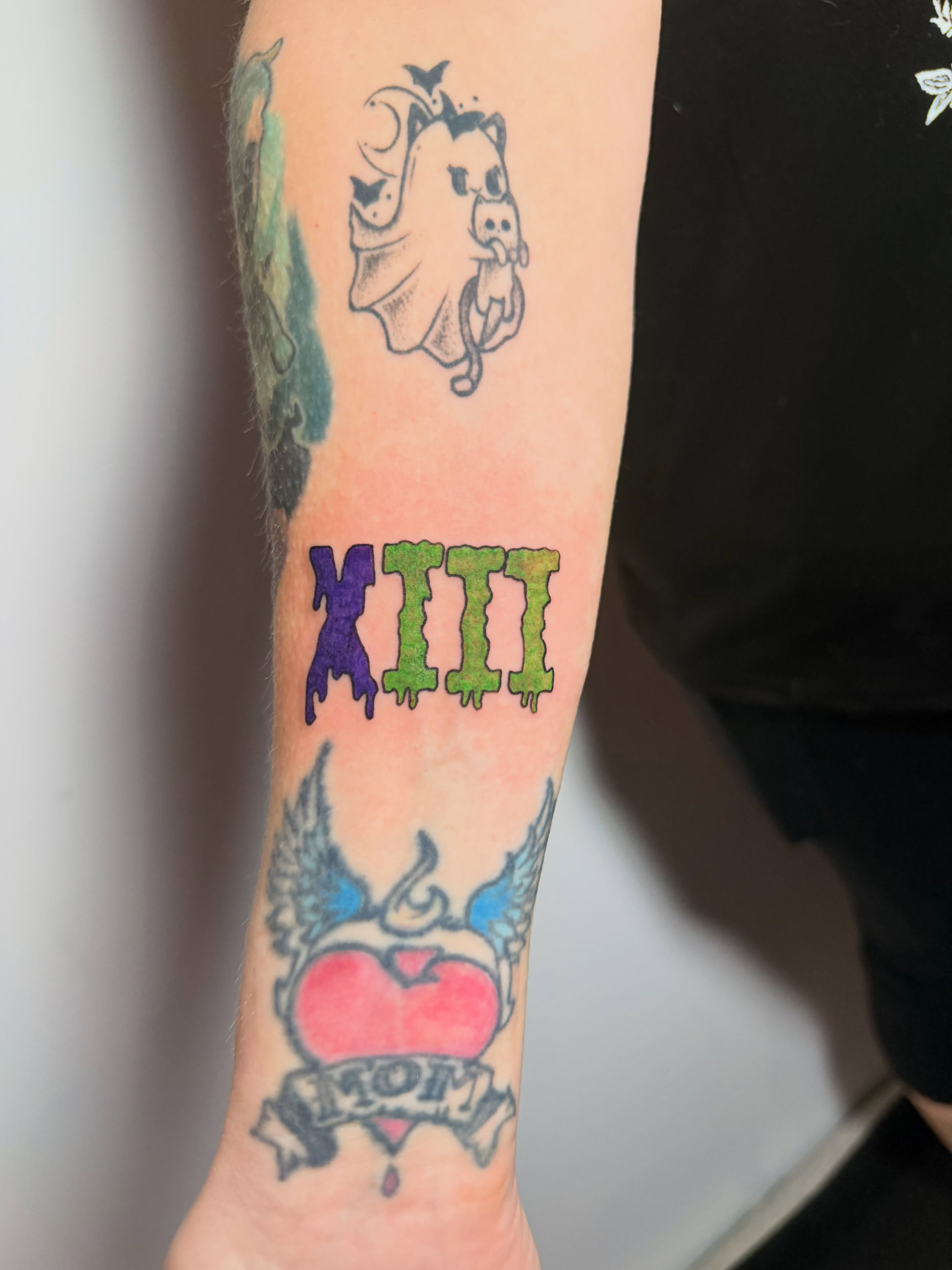 XIII new school tattoo on the forearm by Gabrielle Frelak, York, Pennsylvania