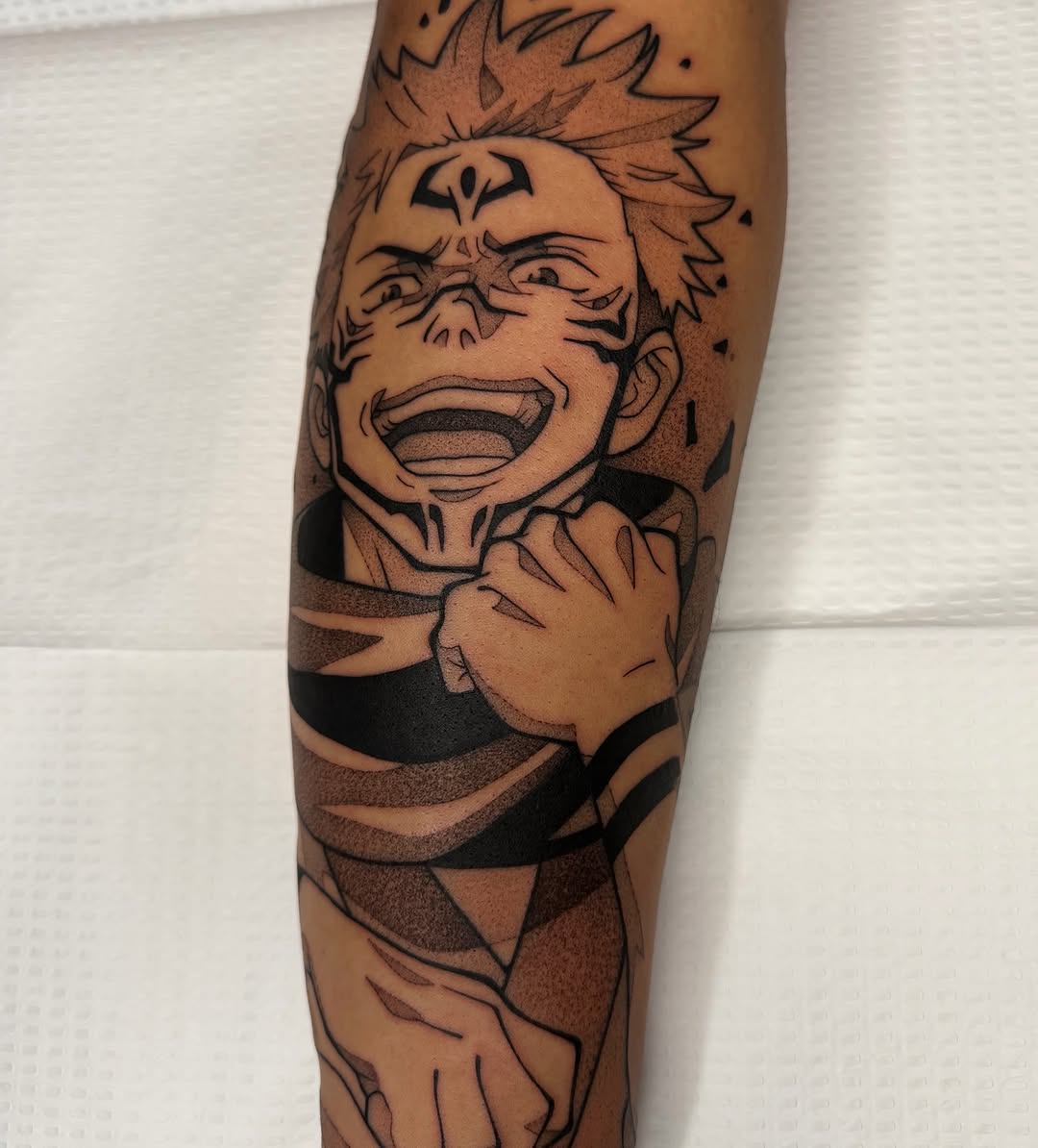 Anime character anime tattoo on the forearm by Z, Greenville, South Carolina