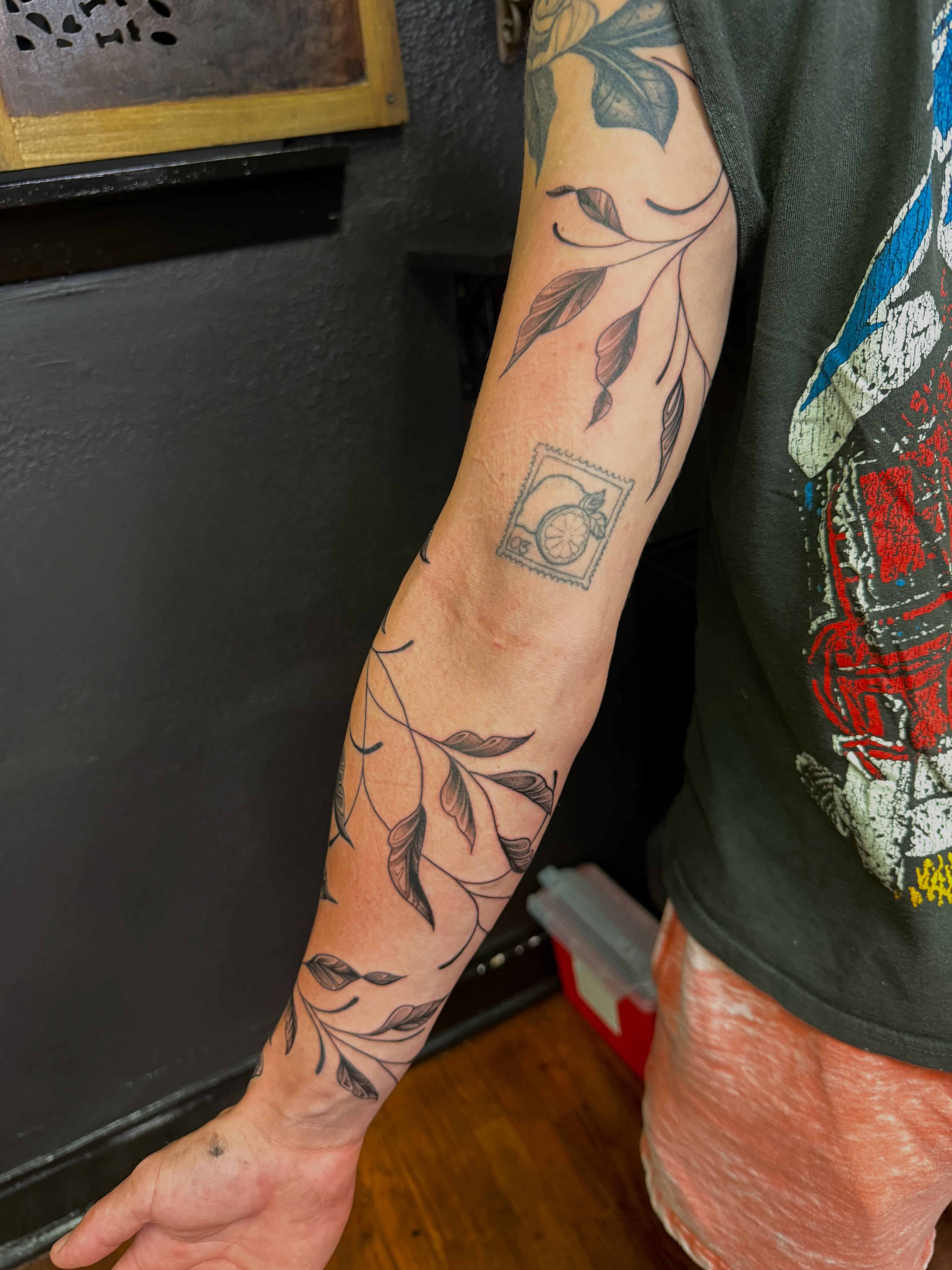 Branch with leaves black and grey tattoo on the forearm by ⁘ heléna tupou-lisle ⁘