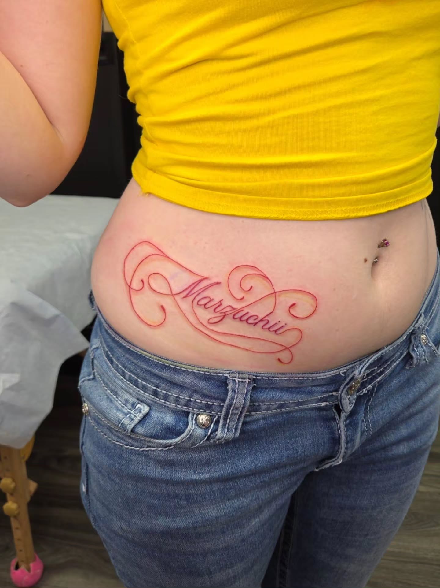 Script lettering lettering script tattoo on the torso by Jessica Duggan