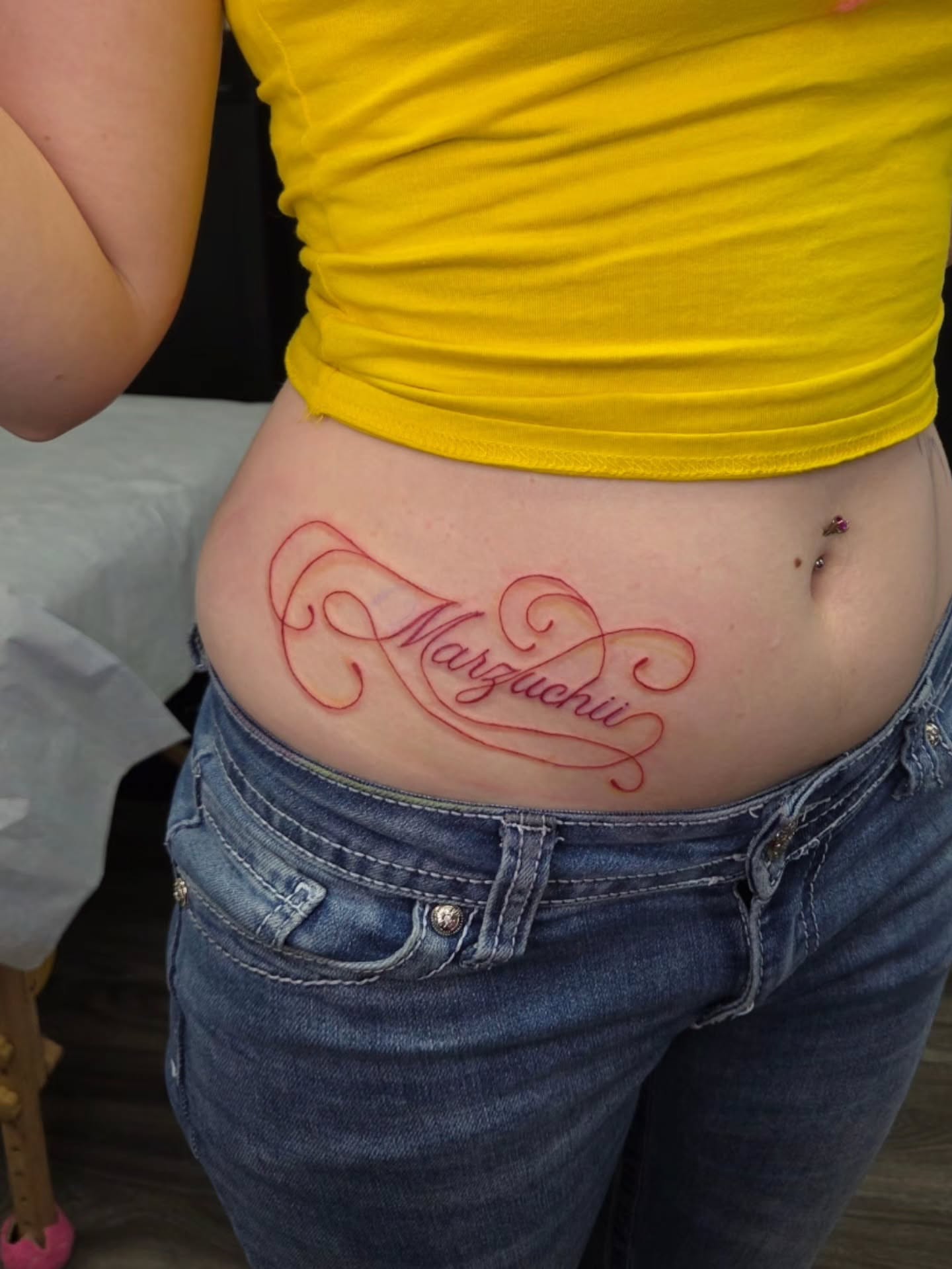 Script lettering lettering script tattoo on the torso by Jessica Duggan