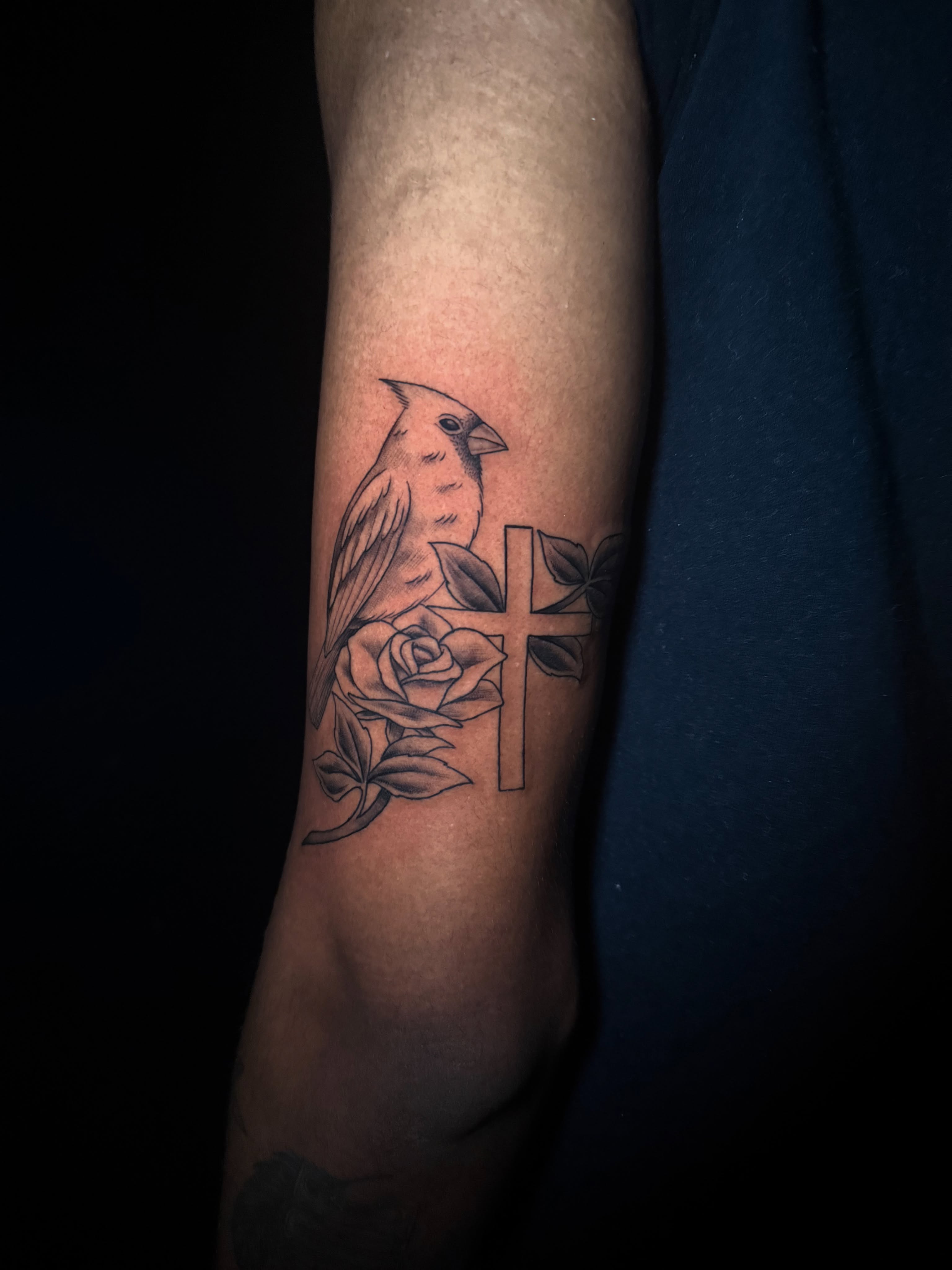 Bird and rose black and grey tattoo on the forearm by Lauren B