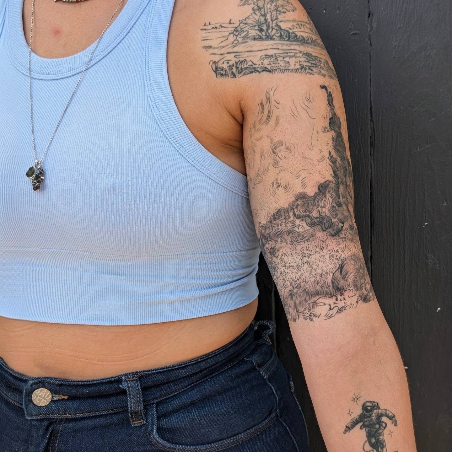 Landscape black and grey tattoo on the forearm by Jhenn