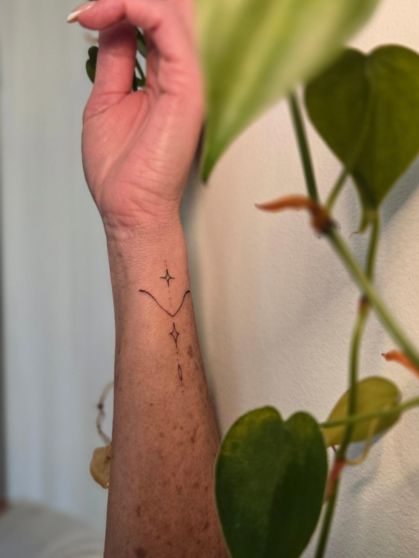 Tattoo by @meditating_ink — minimalist, geometric
