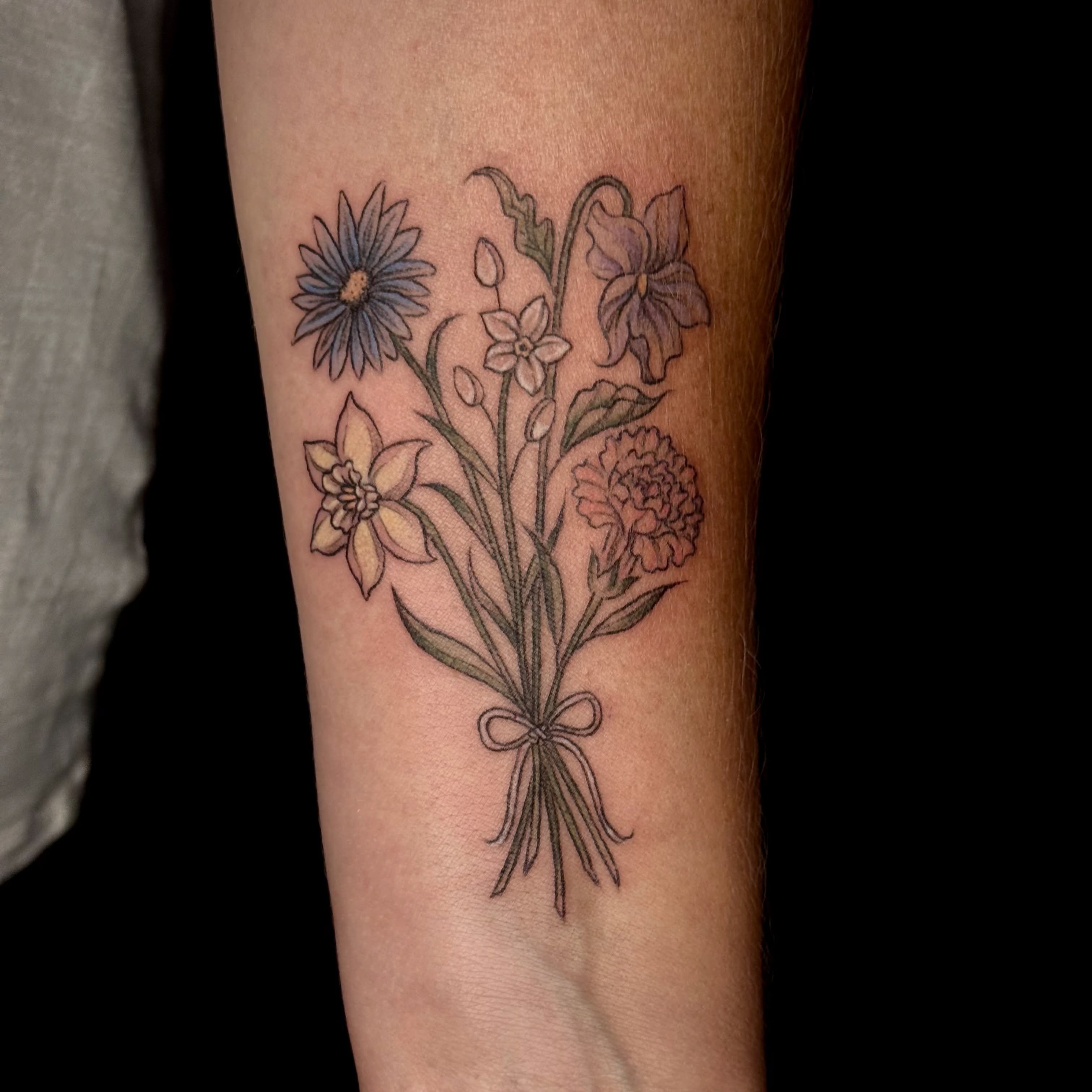 Flower bouquet realism tattoo on the forearm by ๐๐ญ๐ฆ๐จ๐ณ๐ข โ๐๐ฆ๐จโ ๐ฆต