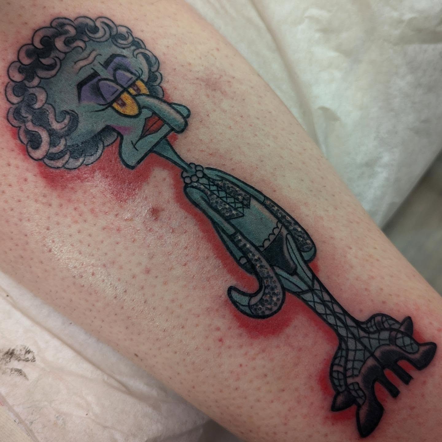Dodo bird neo-traditional tattoo on the forearm by Ryan Slegel
