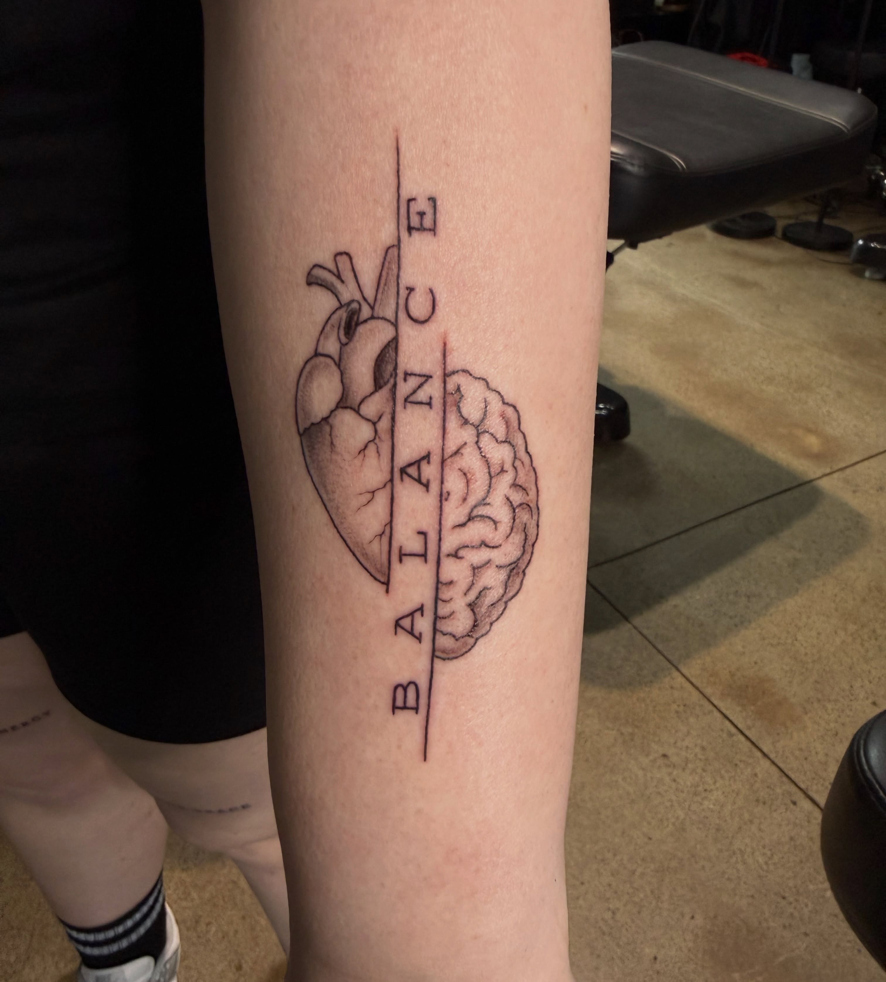 Heart and brain realism tattoo on the forearm by Chloe Peters 🦭🦄🏳️‍🌈