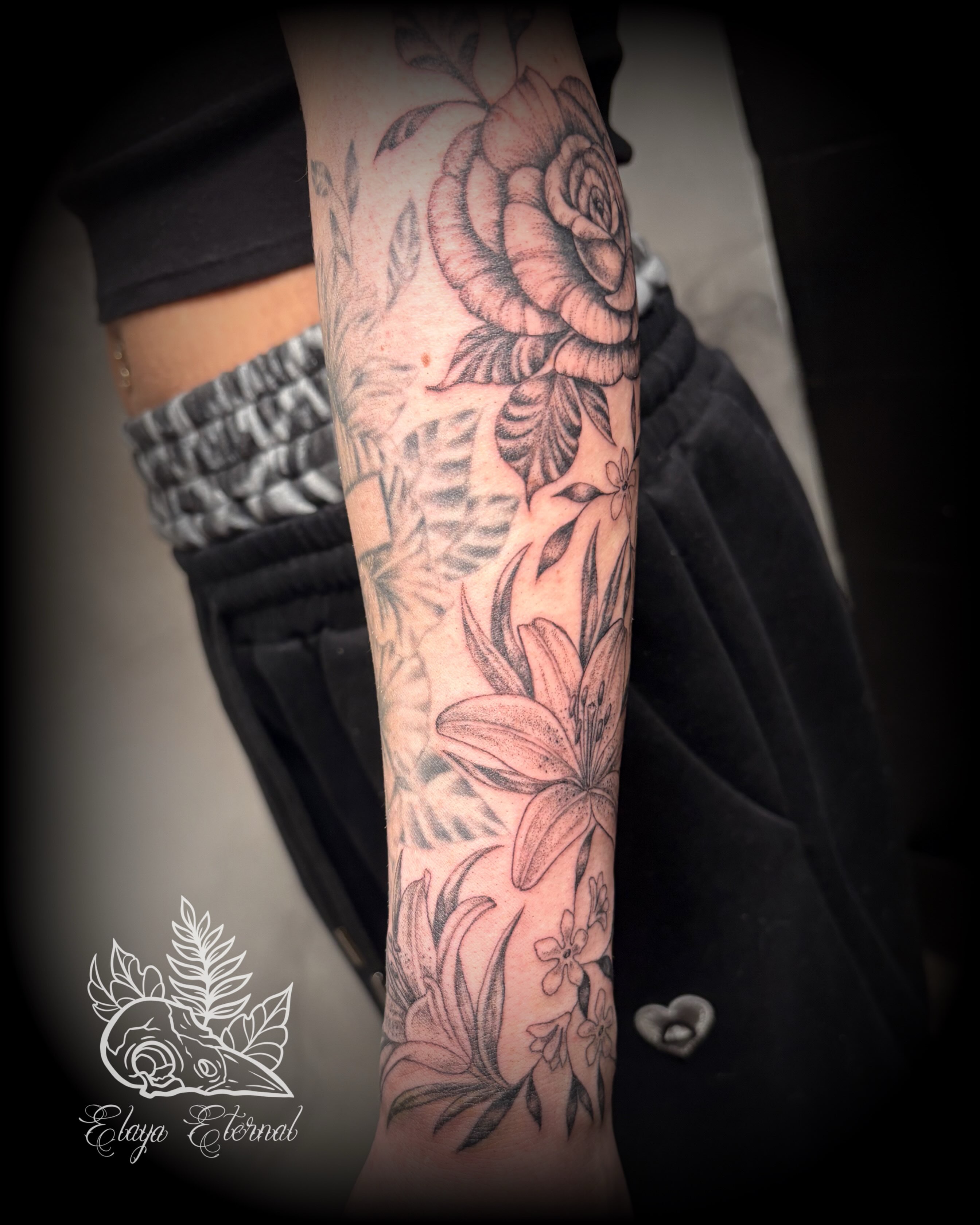 Tattoo by @elaya.tattoo.artistry — black_and_grey