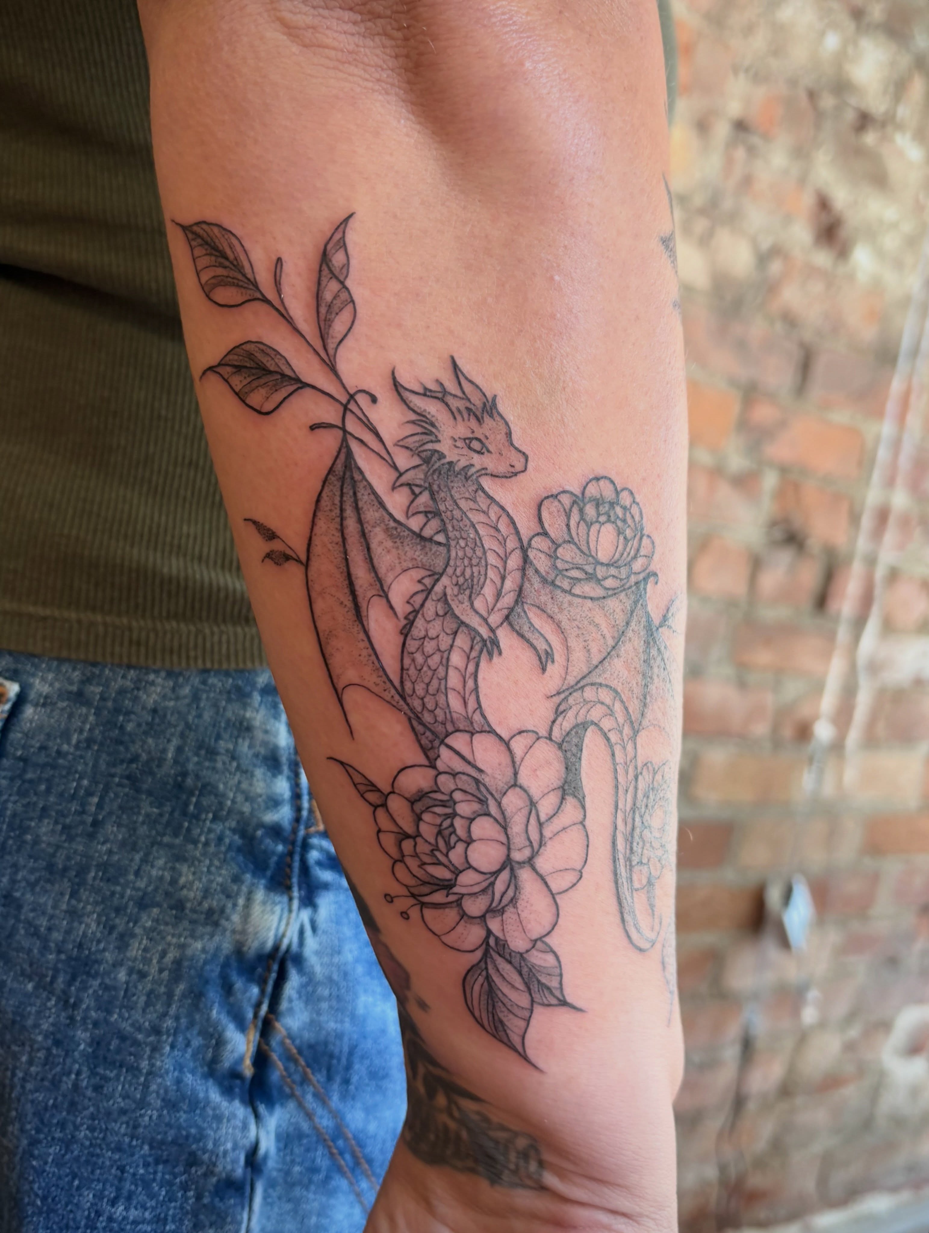 Dragon and flowers black and grey tattoo on the forearm by Jen Osborne ♡ Cincinnati Tattoo Artist