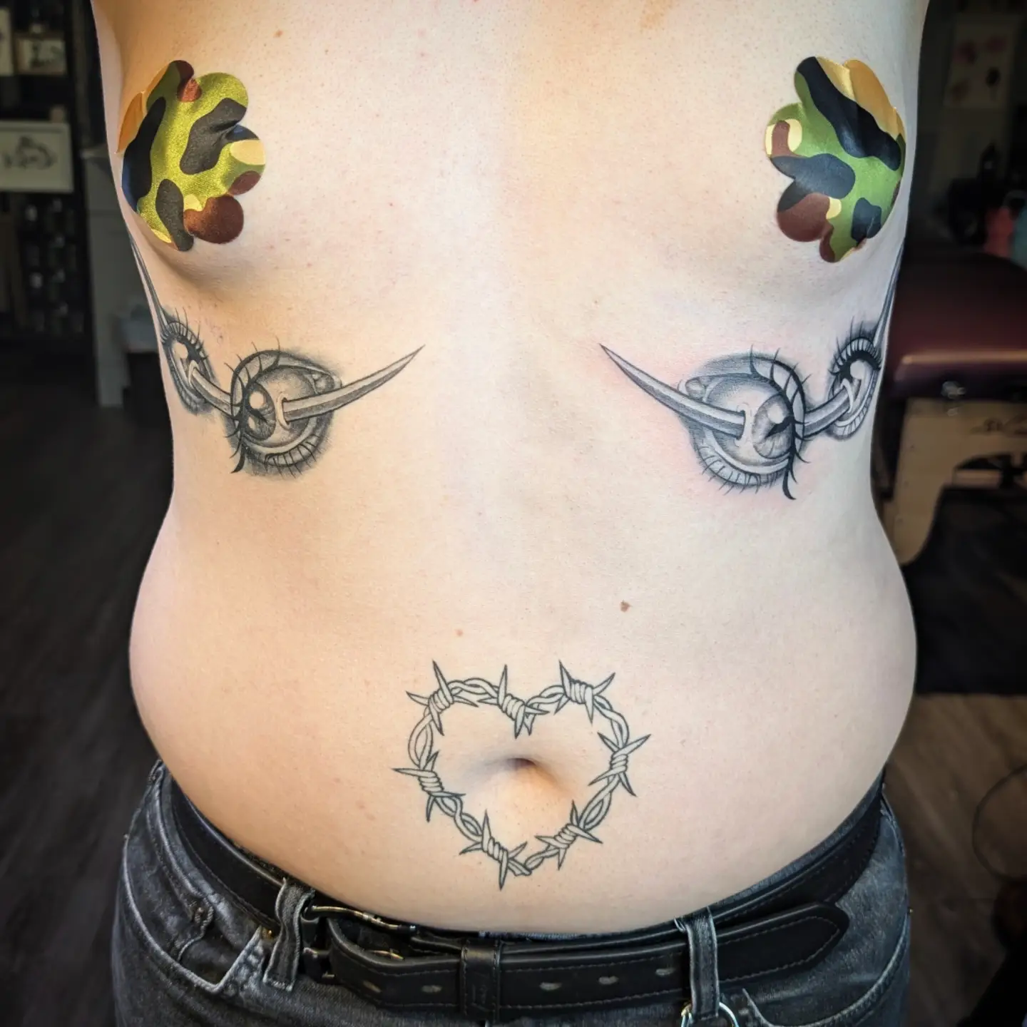 Barbed wire heart black and grey tattoo on the torso by Jo Xylo - Minneapolis Tattoo Artist, Minneapolis, Minnesota