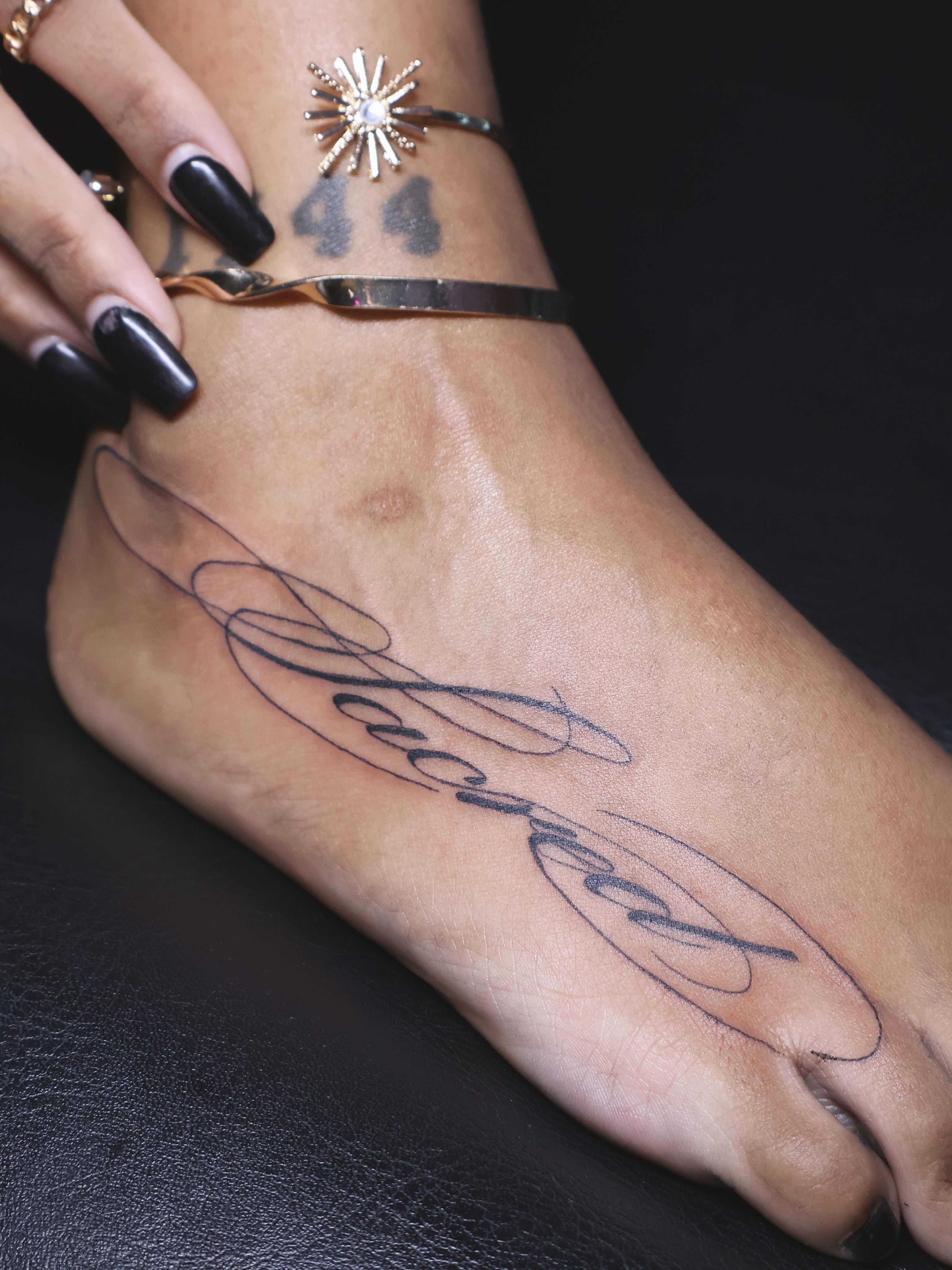 Tattoo by @divinebeautybarbyaly — lettering_script