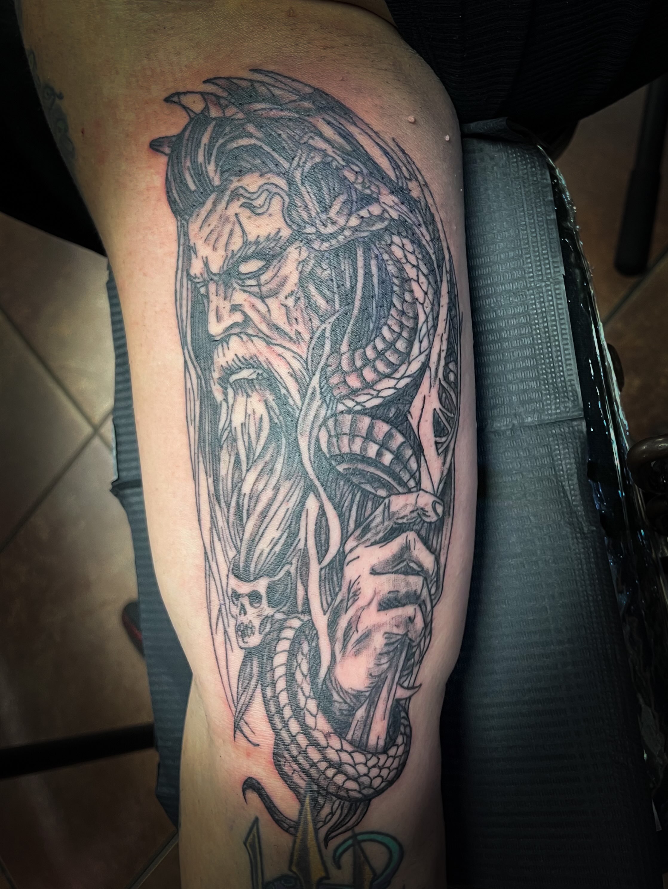 Demon with snake dark realism tattoo on the forearm by Melissa Peña NYC