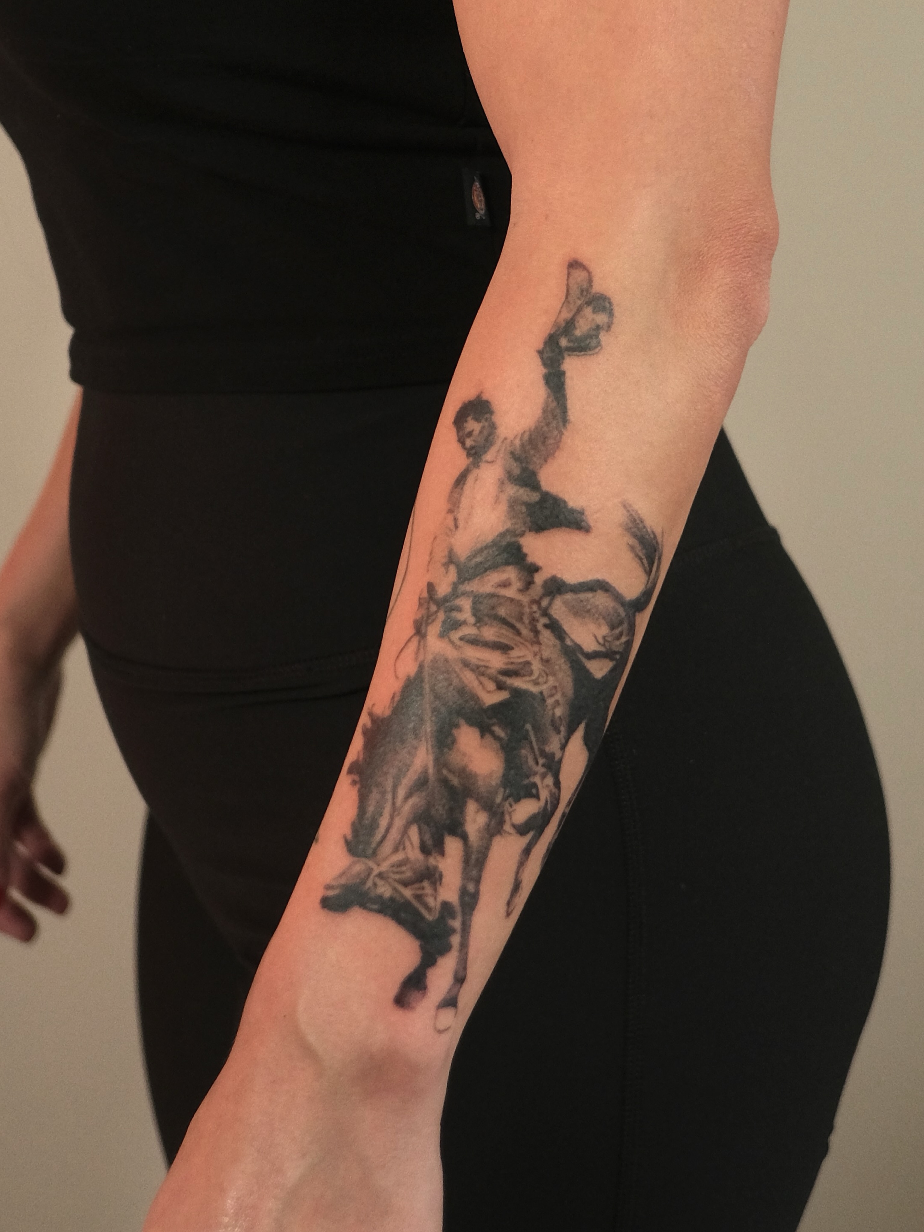 Bull rider realism tattoo on the forearm by Zanereti