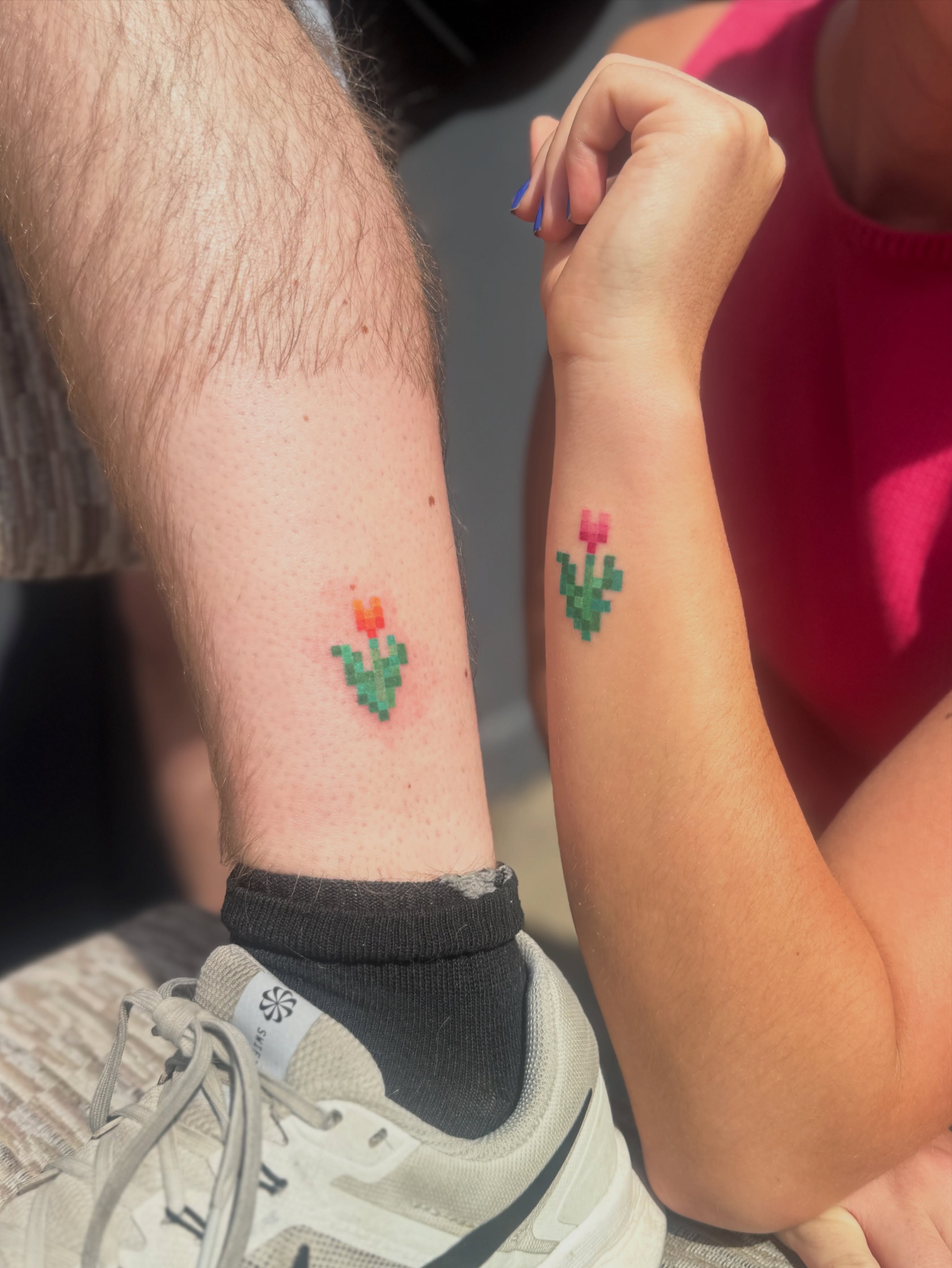 Pixelated cactus dotwork tattoo on the forearm by Leti