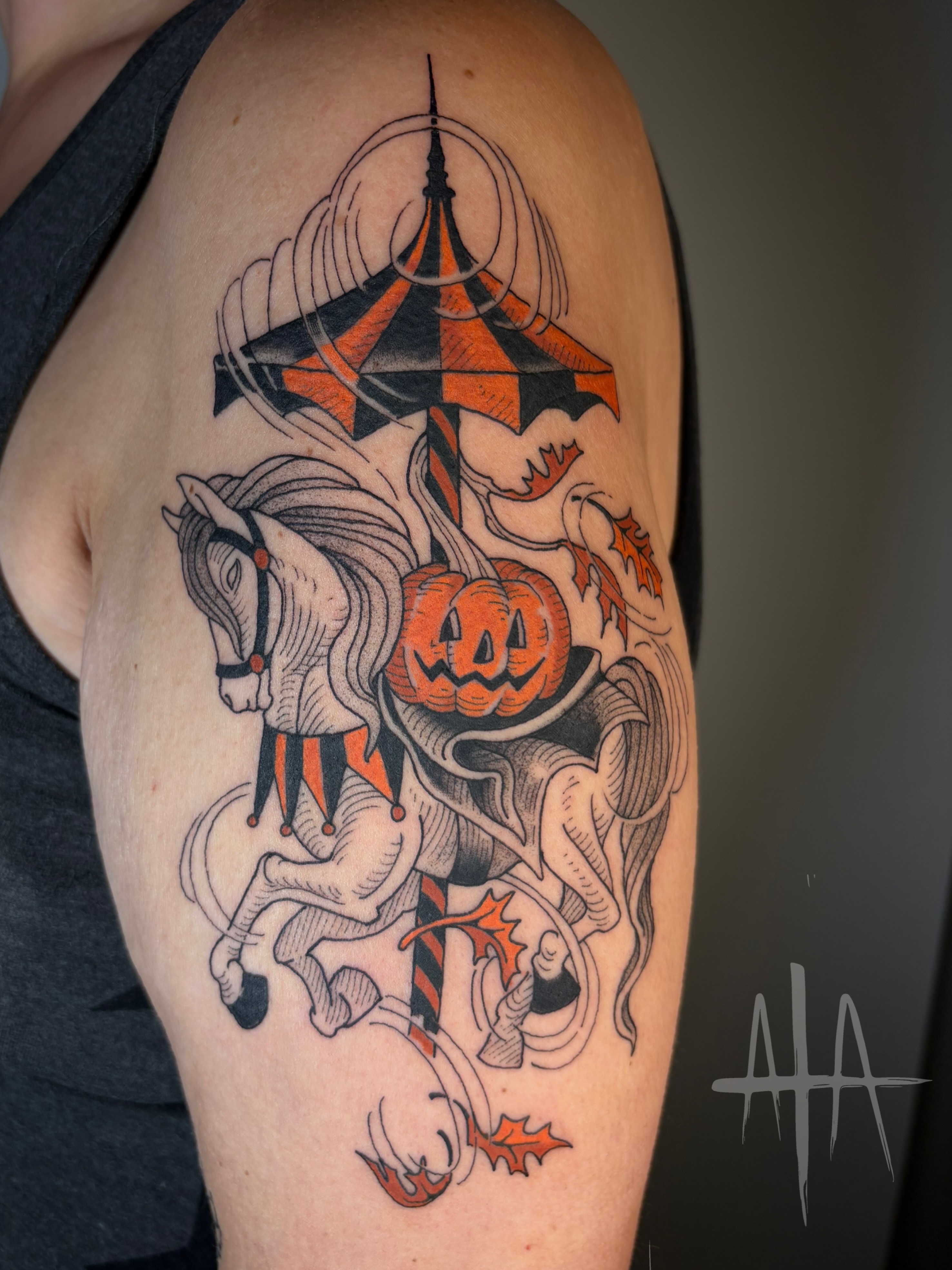 Horse and pumpkin American traditional tattoo on the upper arm by ๐๐๐ฏ๐ฌ๐ซ ๐๐ก๐ก๐๐ช๐ฐ