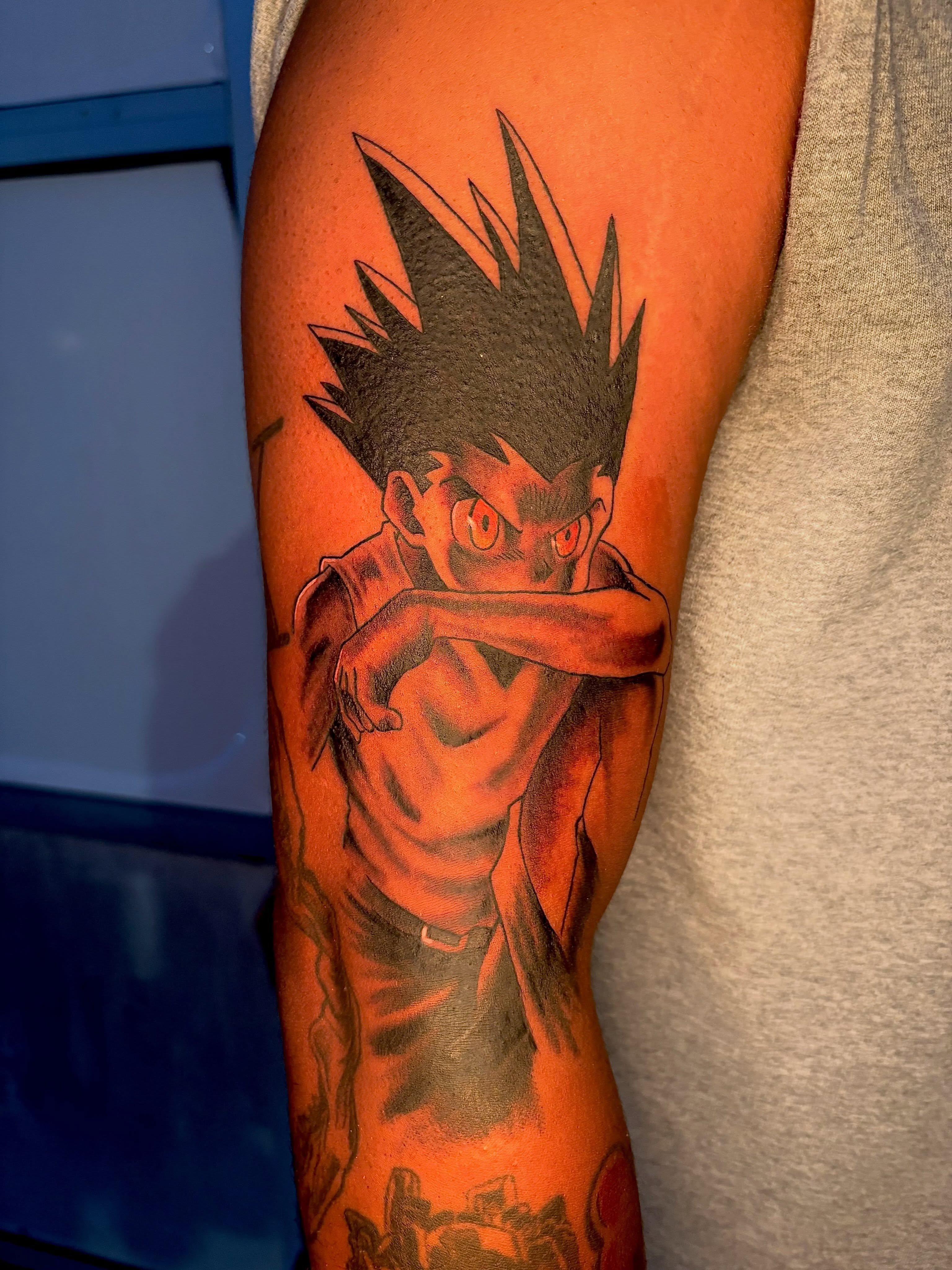Anime character anime tattoo on the forearm by 757 tattooer