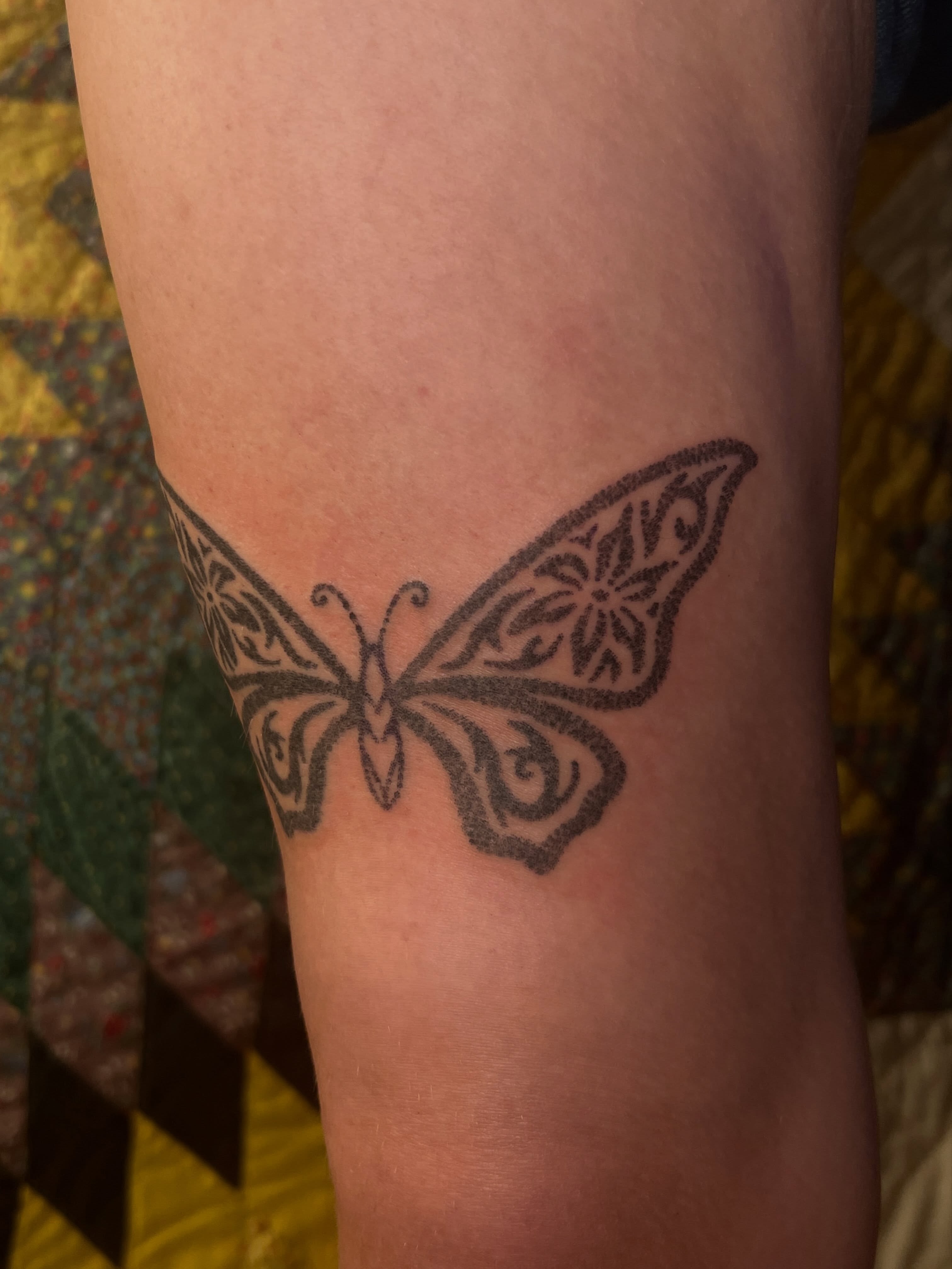 Butterfly black and grey tattoo on the forearm by faith