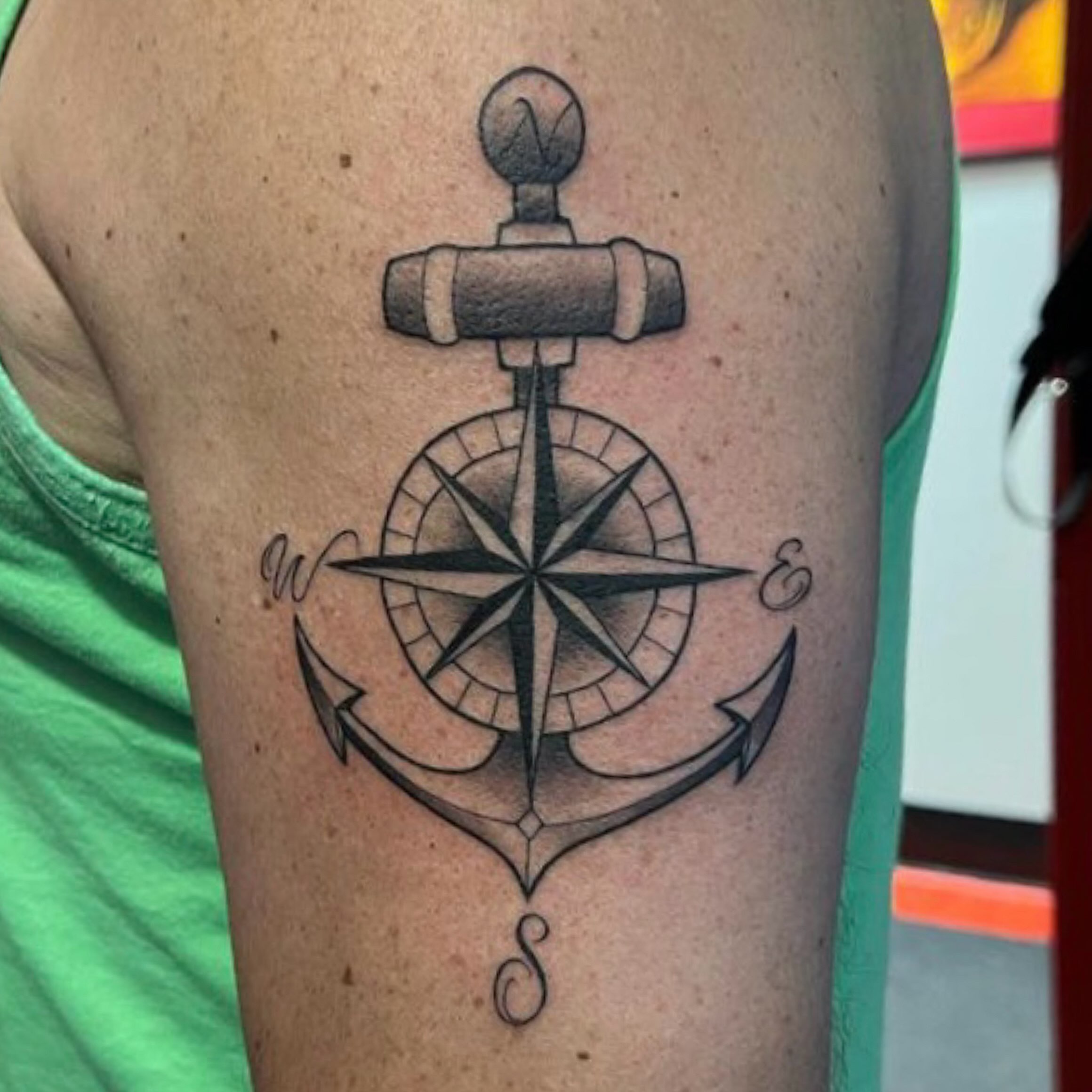 Anchor with compass black and grey tattoo on the thigh by Keith (KAM) Miller