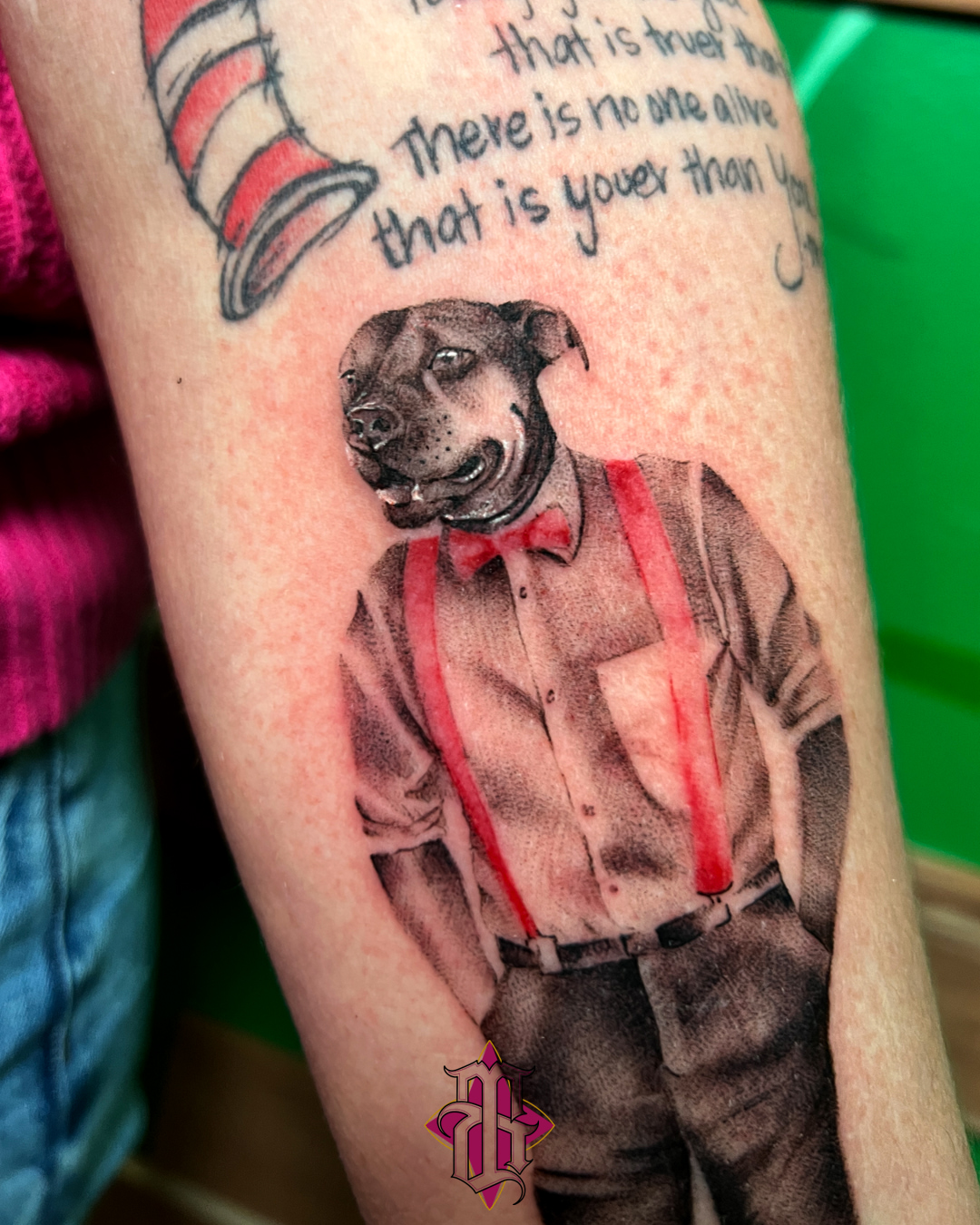 Dog wearing bow tie realism tattoo on the forearm by BRIK RANGEL - Tattoo Artist