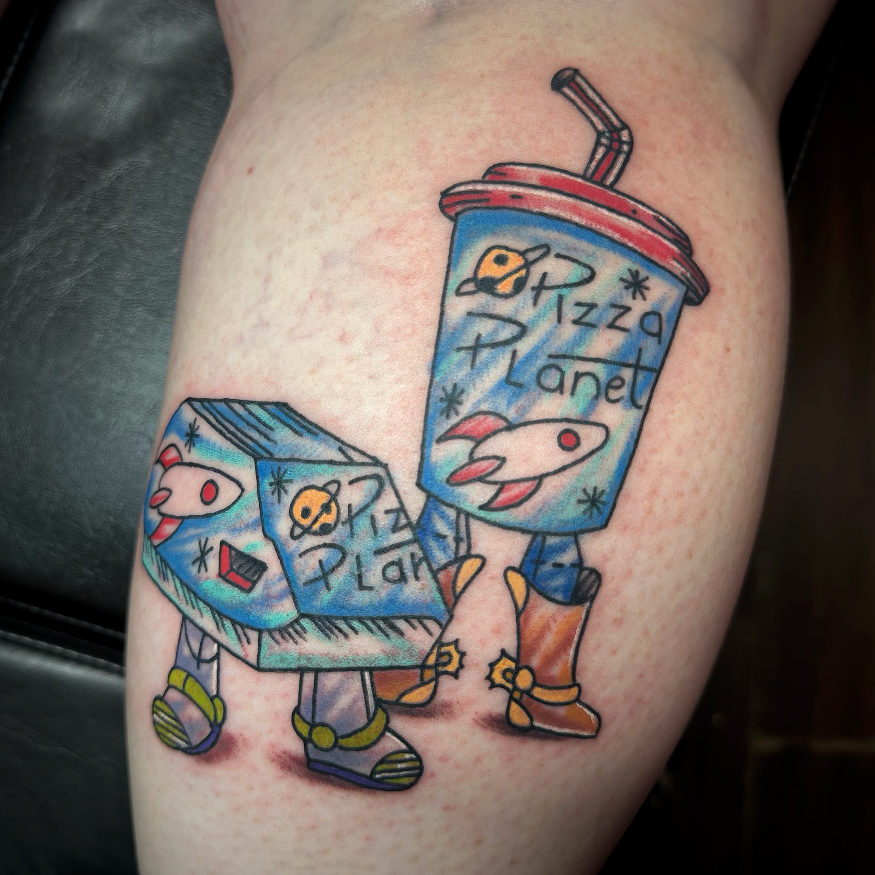 Pizza Planet characters new school tattoo on the thigh by Anthony Guido