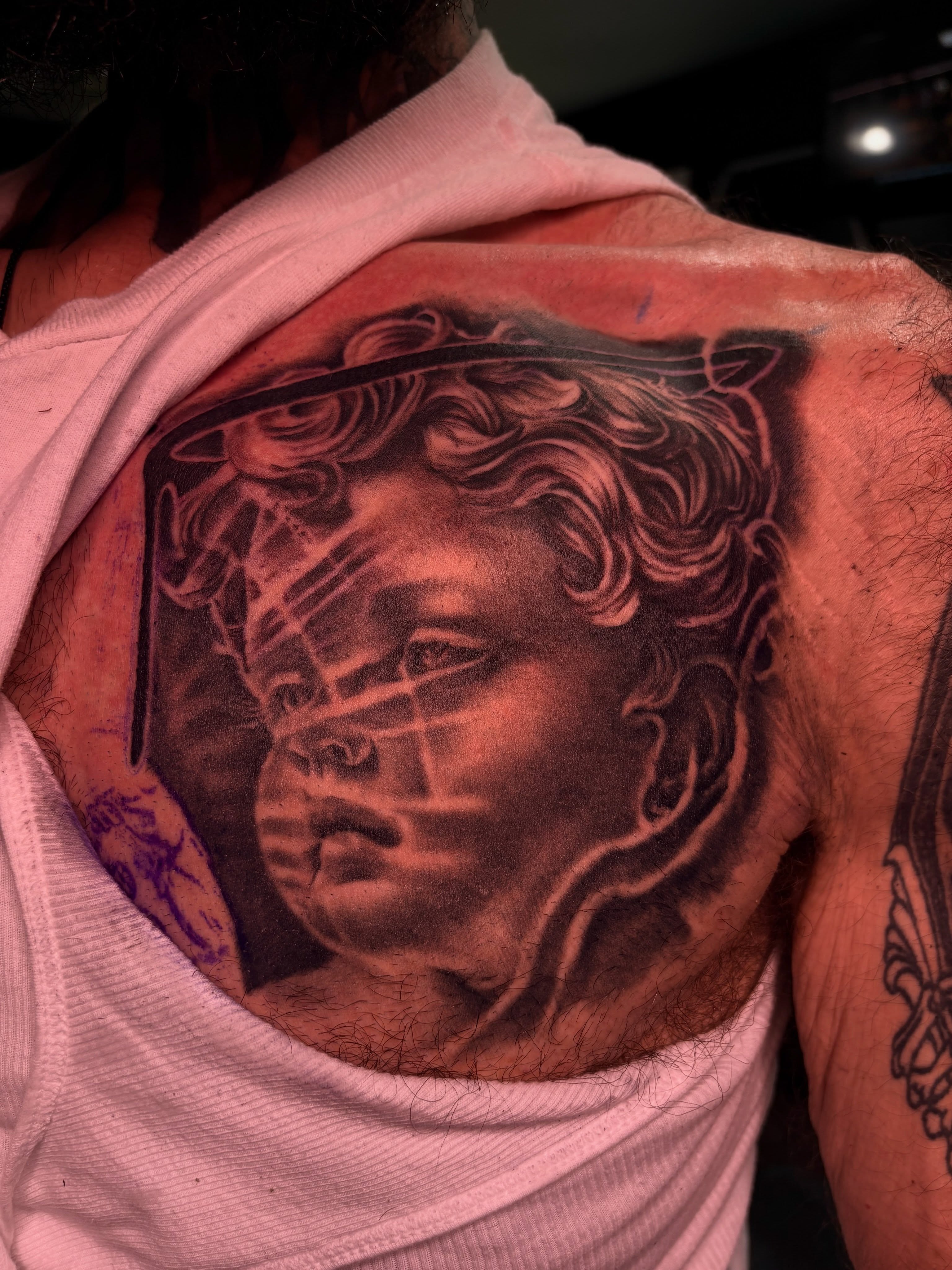 Tattoo by @trigger_tone — realism, black_and_grey