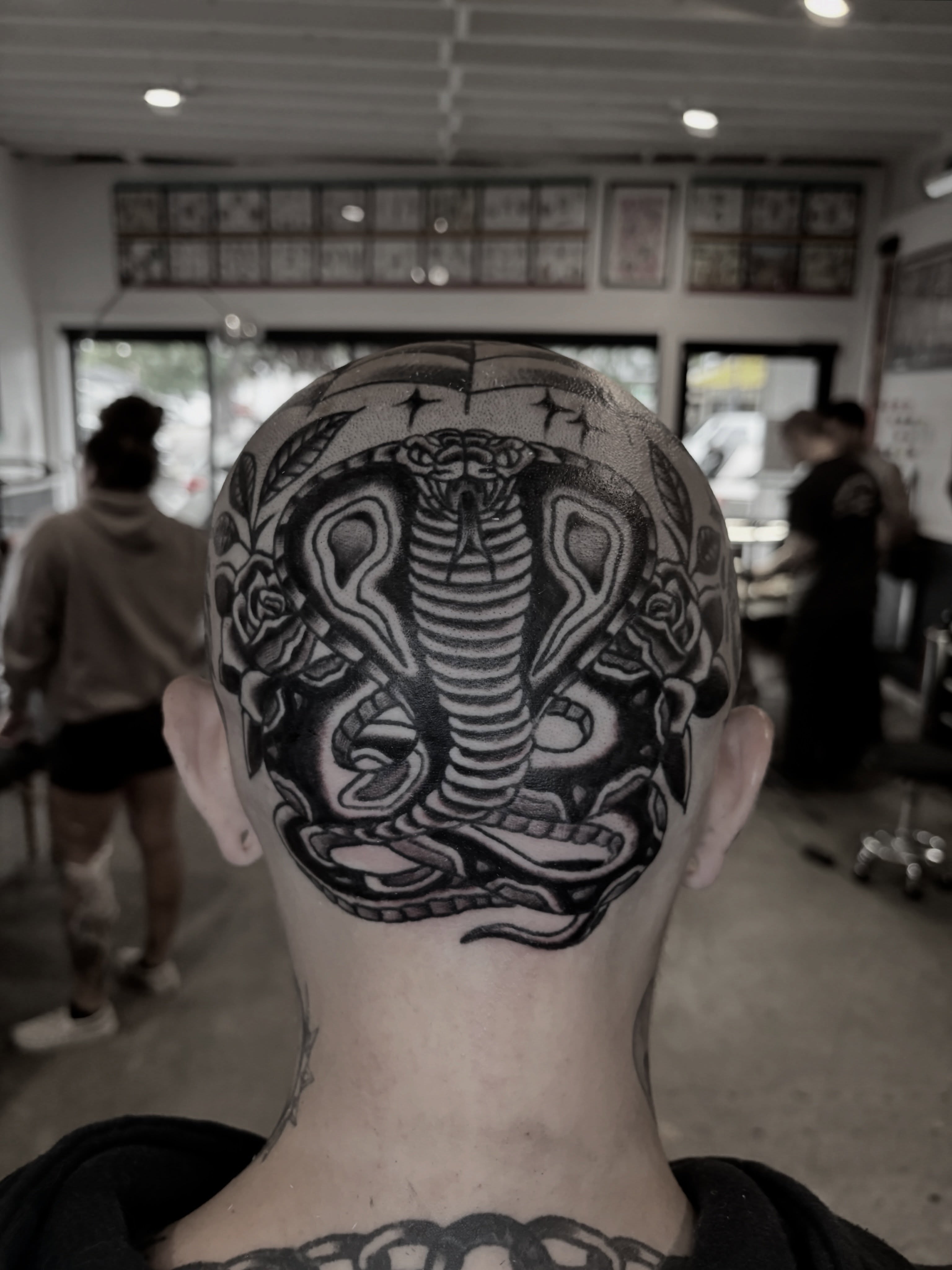 Snake and roses black and grey tattoo on the head by π³πππ πΆπππππ