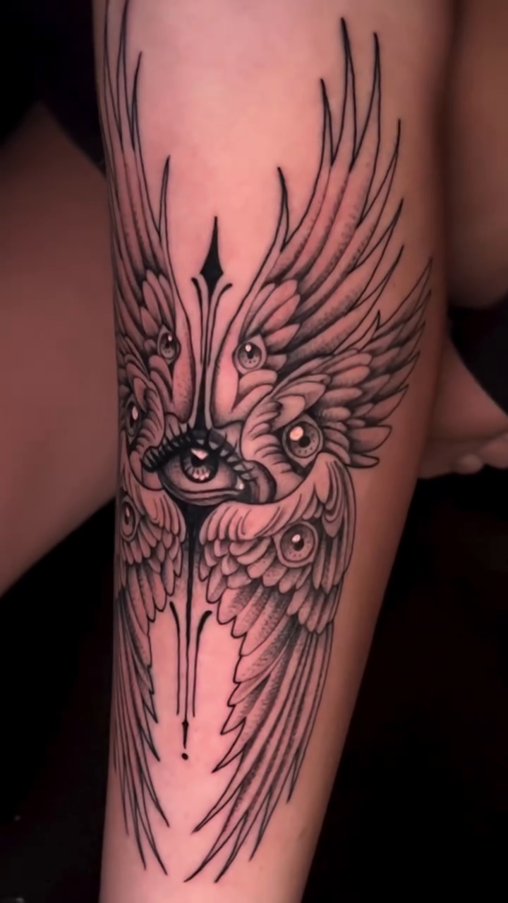 Winged eye fine line tattoo by Ricky Myotte
