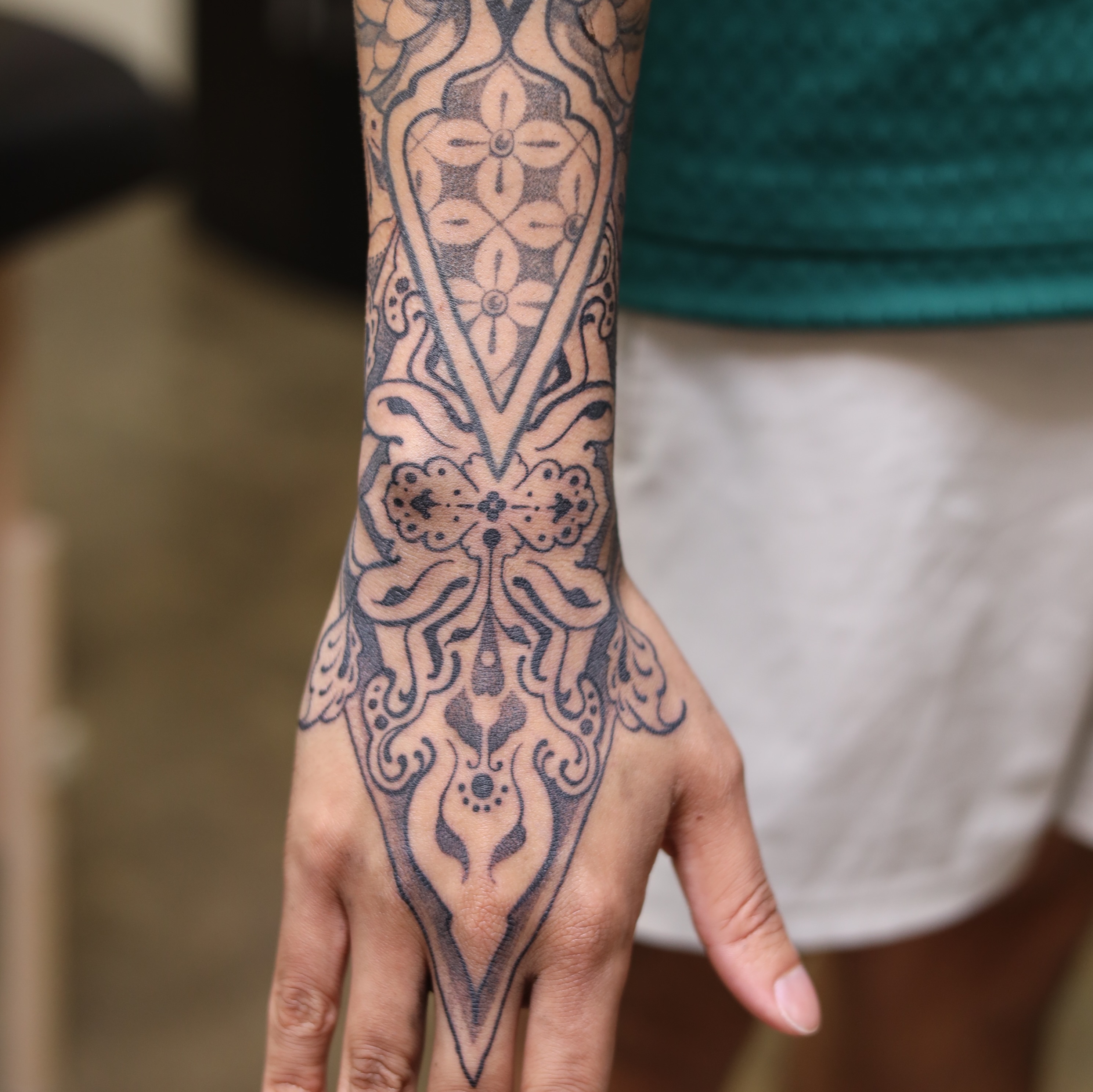 Geometric pattern geometric tattoo on the hand by Caleb Ortiz