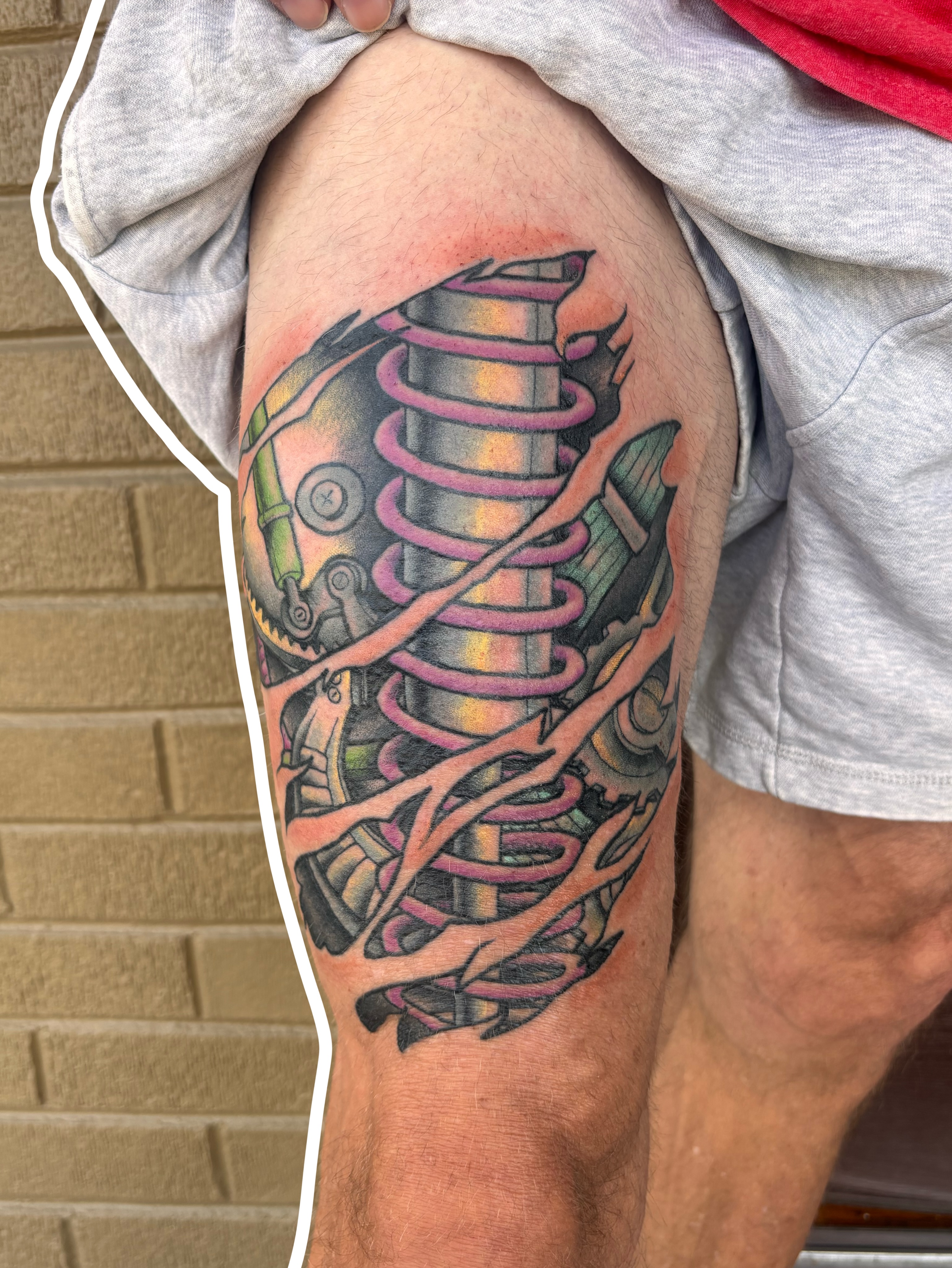Mechanical spring geometric tattoo on the thigh by Emmy Stepien
